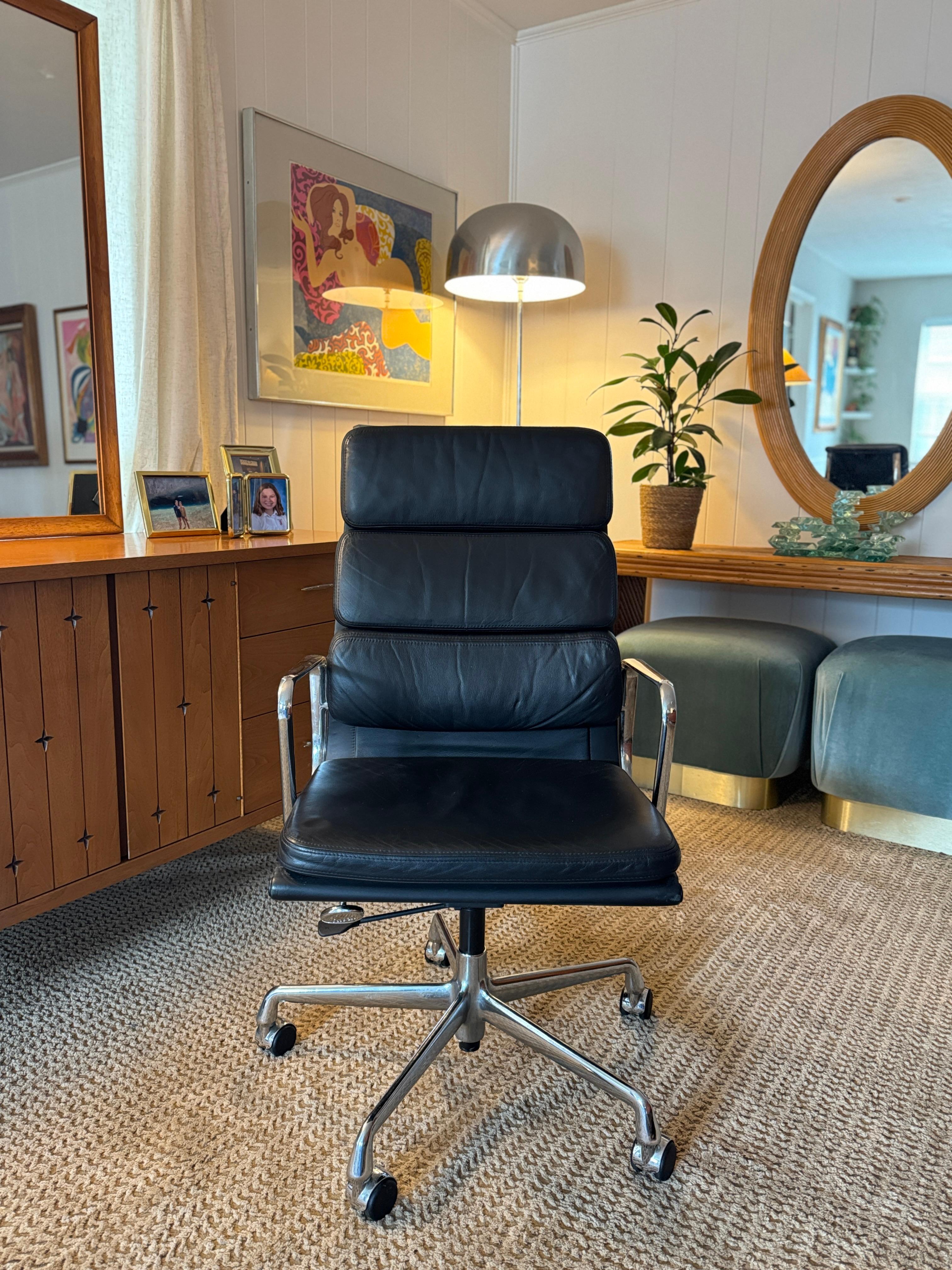 A beautiful high back softpad office chair by Charles Eames for Vitra, circa 1990s. Chair model Ea-219 in the butteriest black leather. Has  both tilt function and height adjustment for ultimate comfort. Overall in very good original condition with