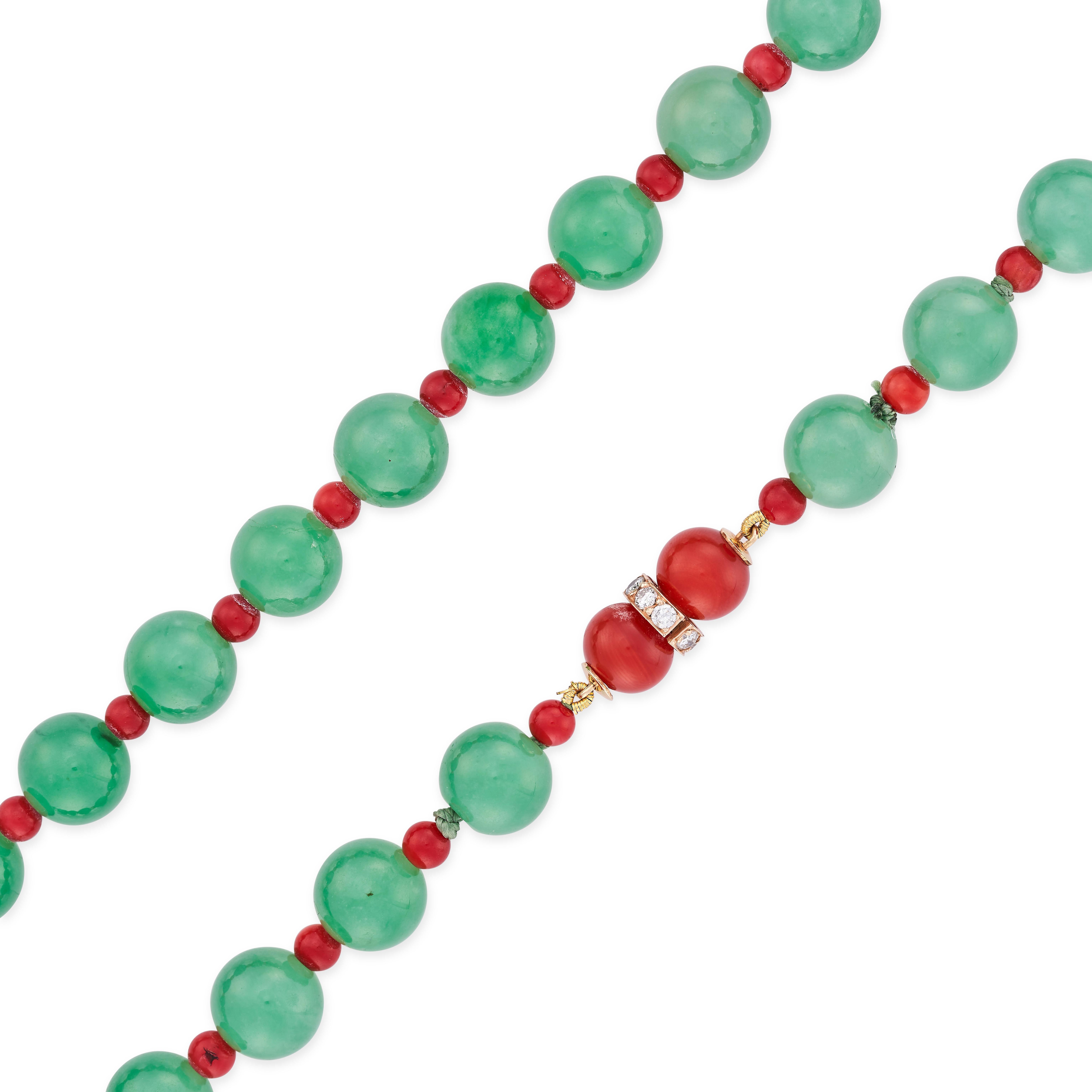 This elegant and eye-catching necklace is composed of  a row of alternating jadeite jade and polished coral beads in contrasting green and orange tones. The clasp of the necklace is set with further polished coral beads and round brilliant cut