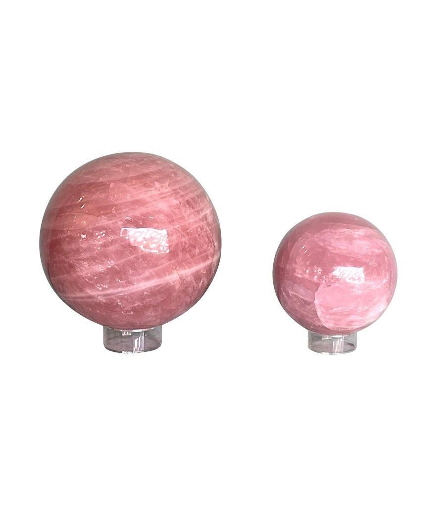 A beautiful large Rose quartz polished sphere from Madagascar on acrylic stand In Good Condition For Sale In London, GB