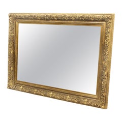 A Beautiful Late 19th Century Carved Giltwood and Gesso Mirror