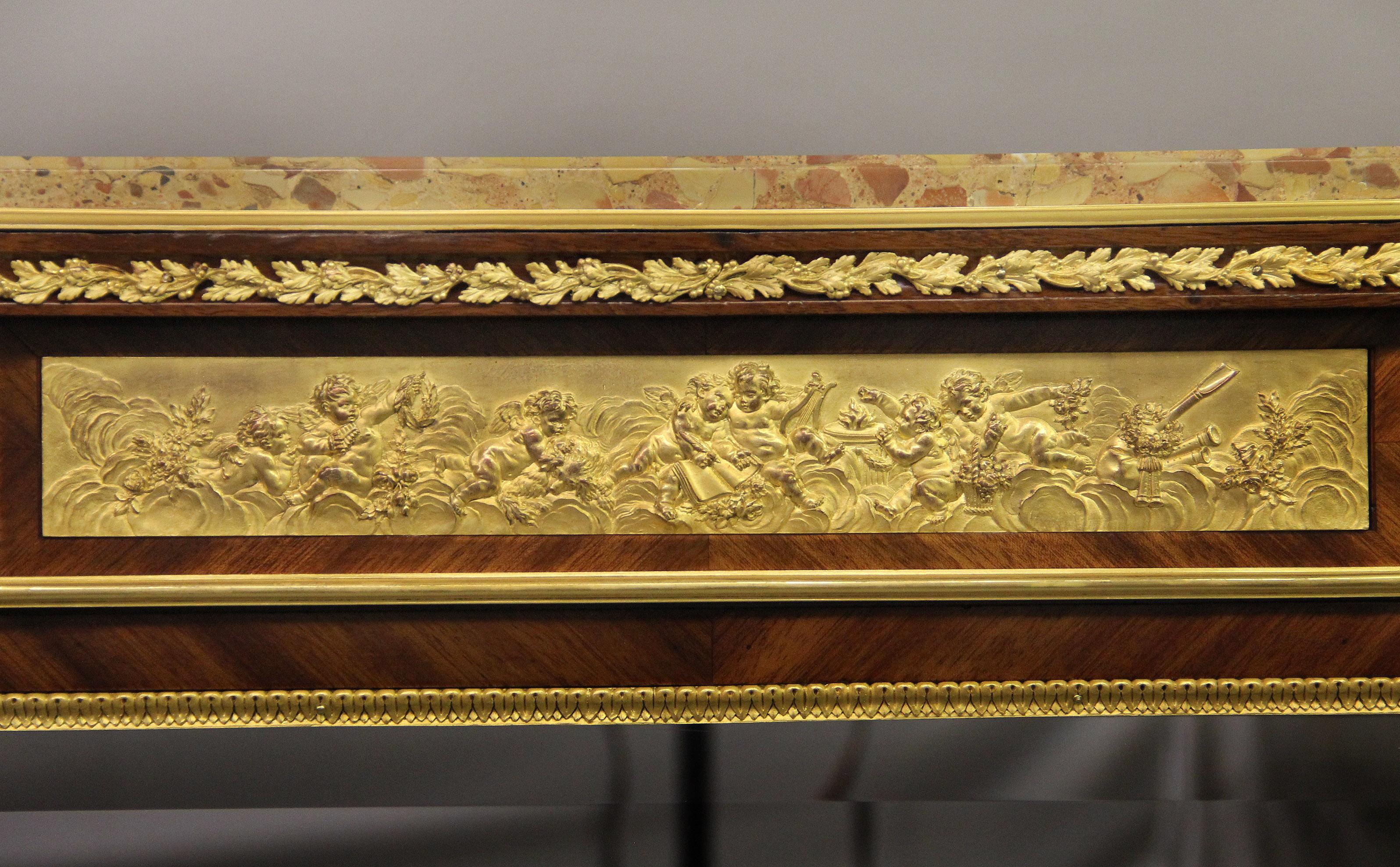 A beautiful late 19th century Louis XV style gilt bronze mounted Vernis Martin Vitrine by François Linke

François Linke – Index no. 75

The brèche d' alep marble top above scrolling foliage centered by an ormolu frieze of frolicking putti, the