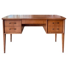 A beautiful mid century modern light walnut mid century modern desk, circa 1960s