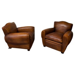 A Beautiful Pair of 1950’s French Leather Club Chairs Chapeau de Gendarme Models