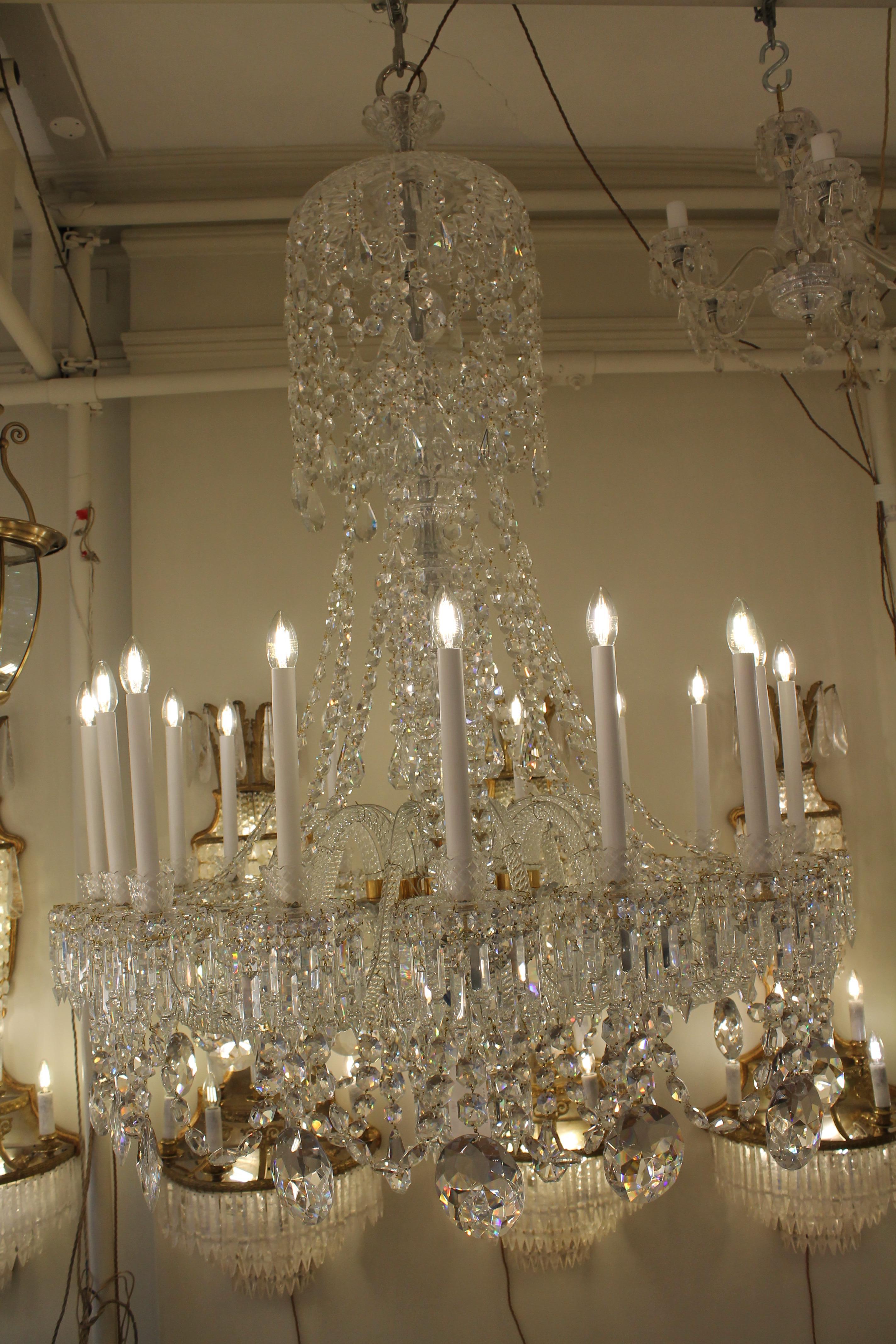 A beautiful pair of French Baccarat Crystal chandeliers with 16 lights ...