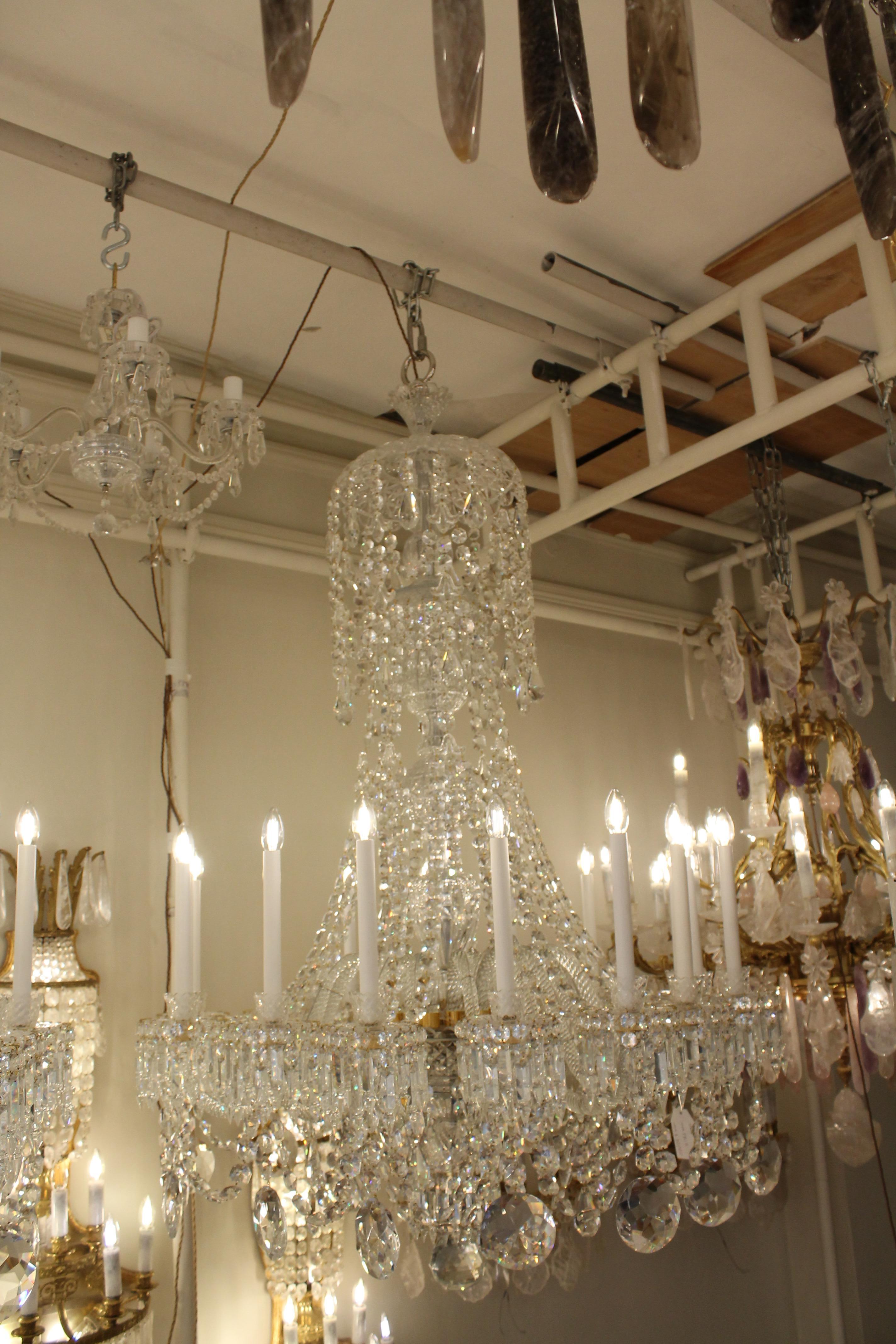 A beautiful pair of French Baccarat Crystal chandeliers with 16 lights ...