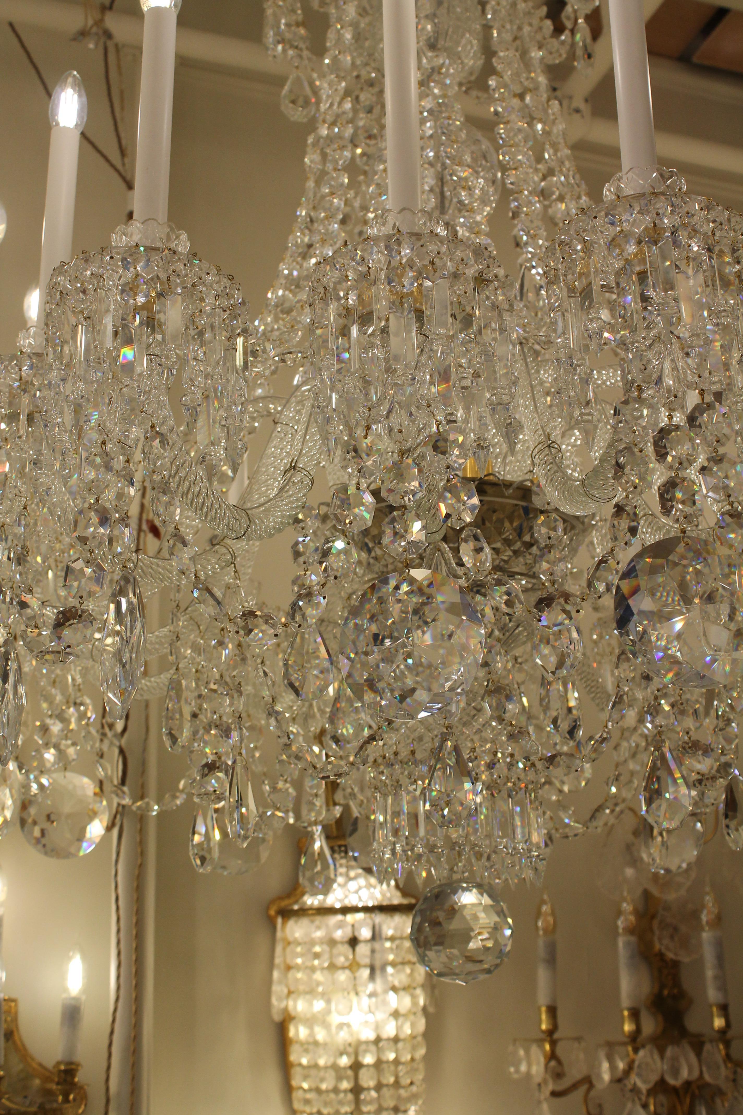A beautiful pair of French Baccarat Crystal chandeliers with 16 lights ...