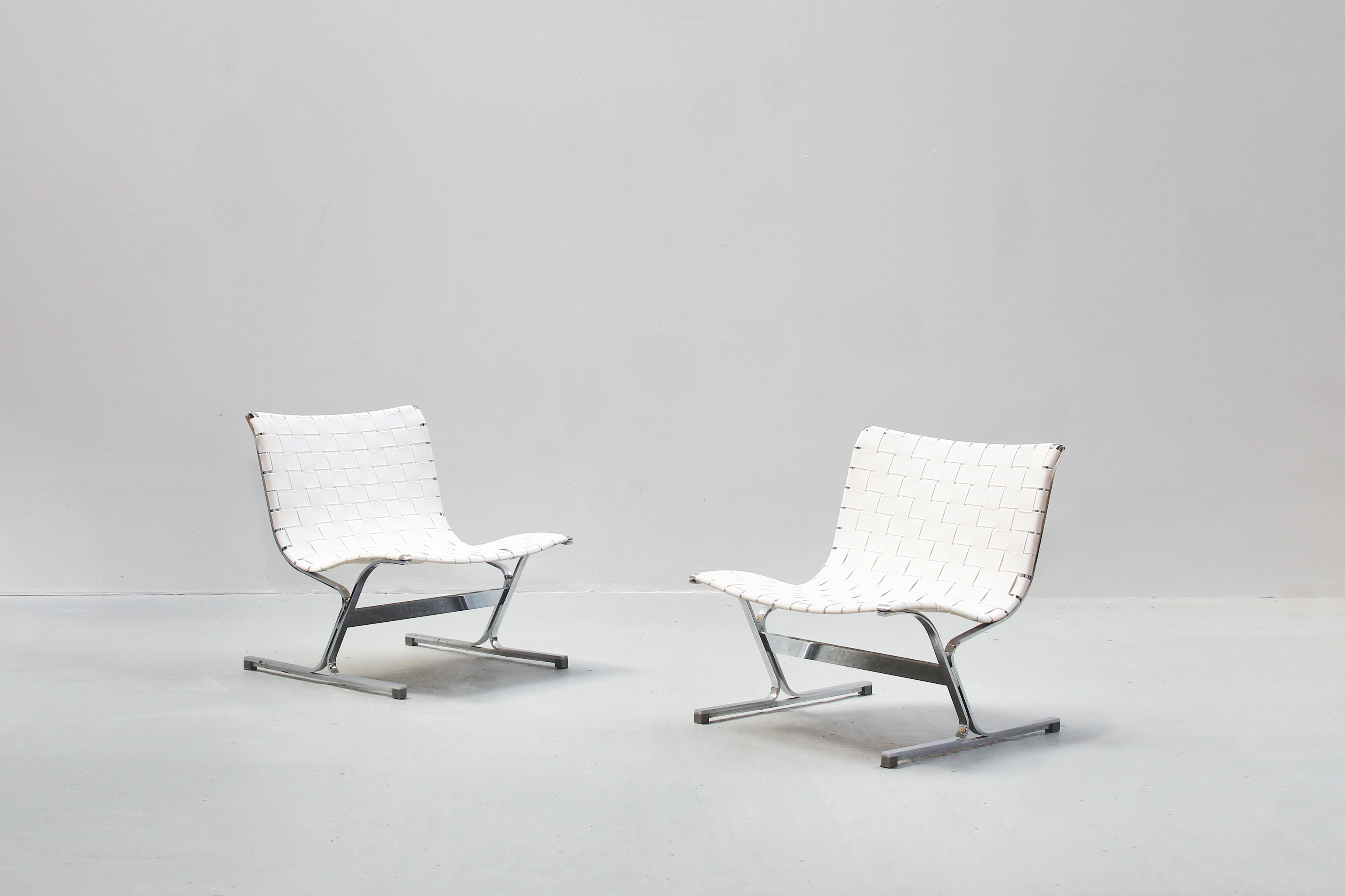 A pair of beautiful lounge chairs designed by Ross Littell and produced by ICF, Italy in the 1970s.
Both chairs are covered with white fabric belts and come in a very good condition with just little traces of usage.

   

    