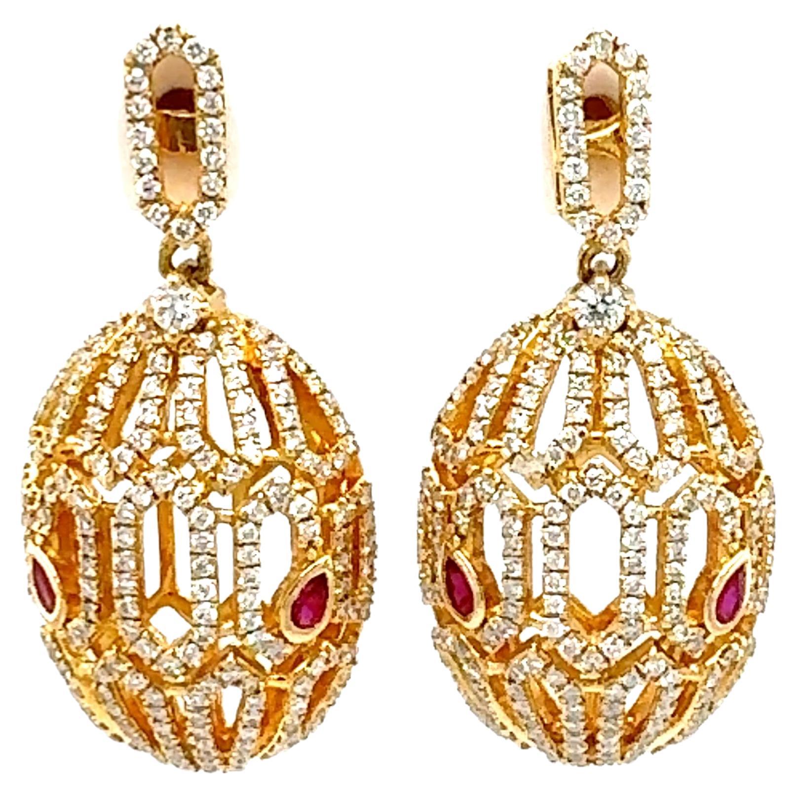 A beautiful pair of ruby and diamond earrings For Sale