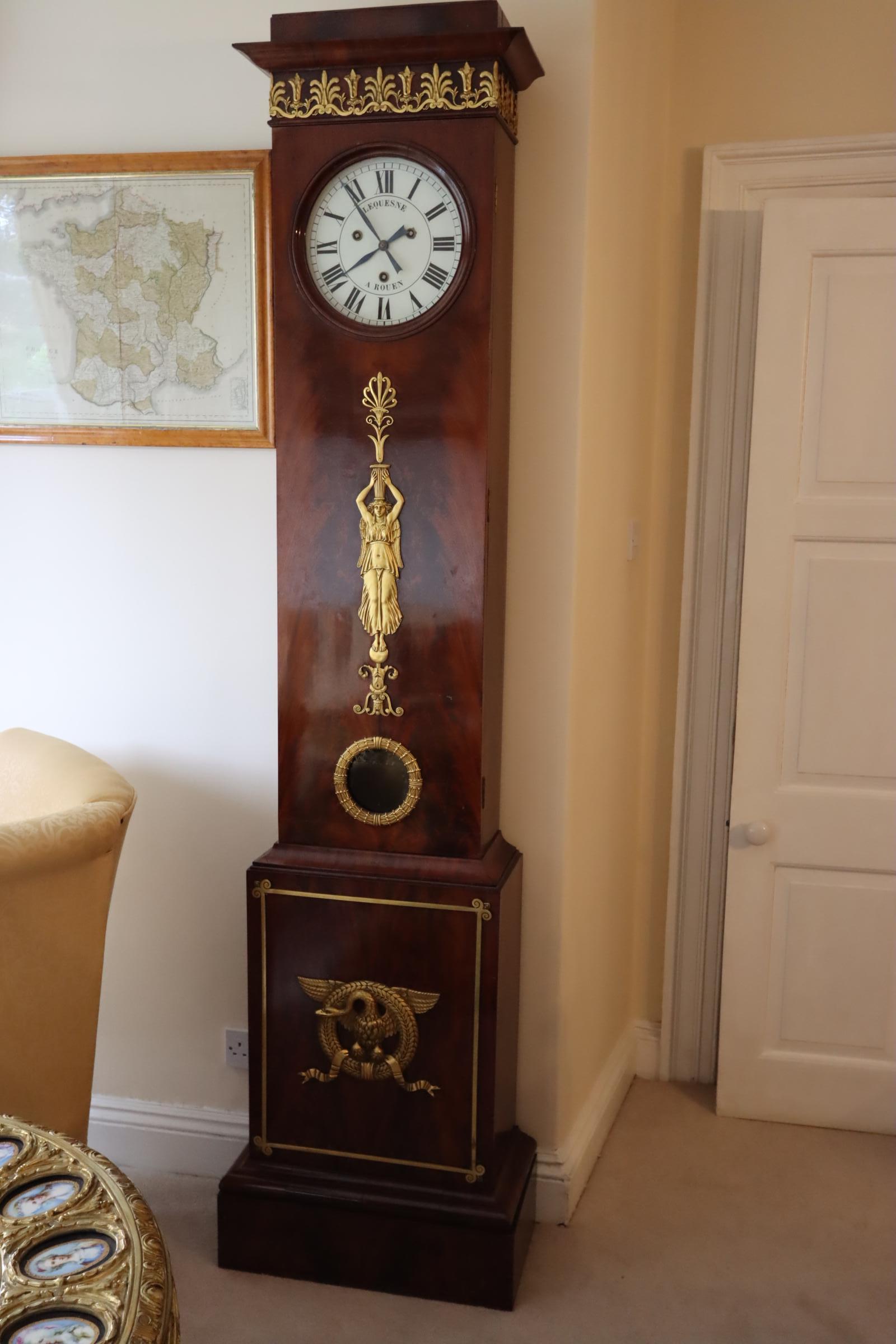 A beautiful 19th Century Mahogony lequesne Longcase Clock with Guilt Bronze mounts.

