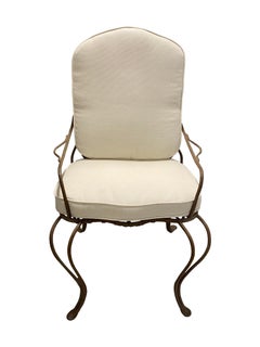 Rose Tarlow's iron "Twig" outdoor dining table and chairs with new cushions