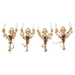 A beautiful set of 4 19th c Louis XV gilt bronze and patinated bronze sconces