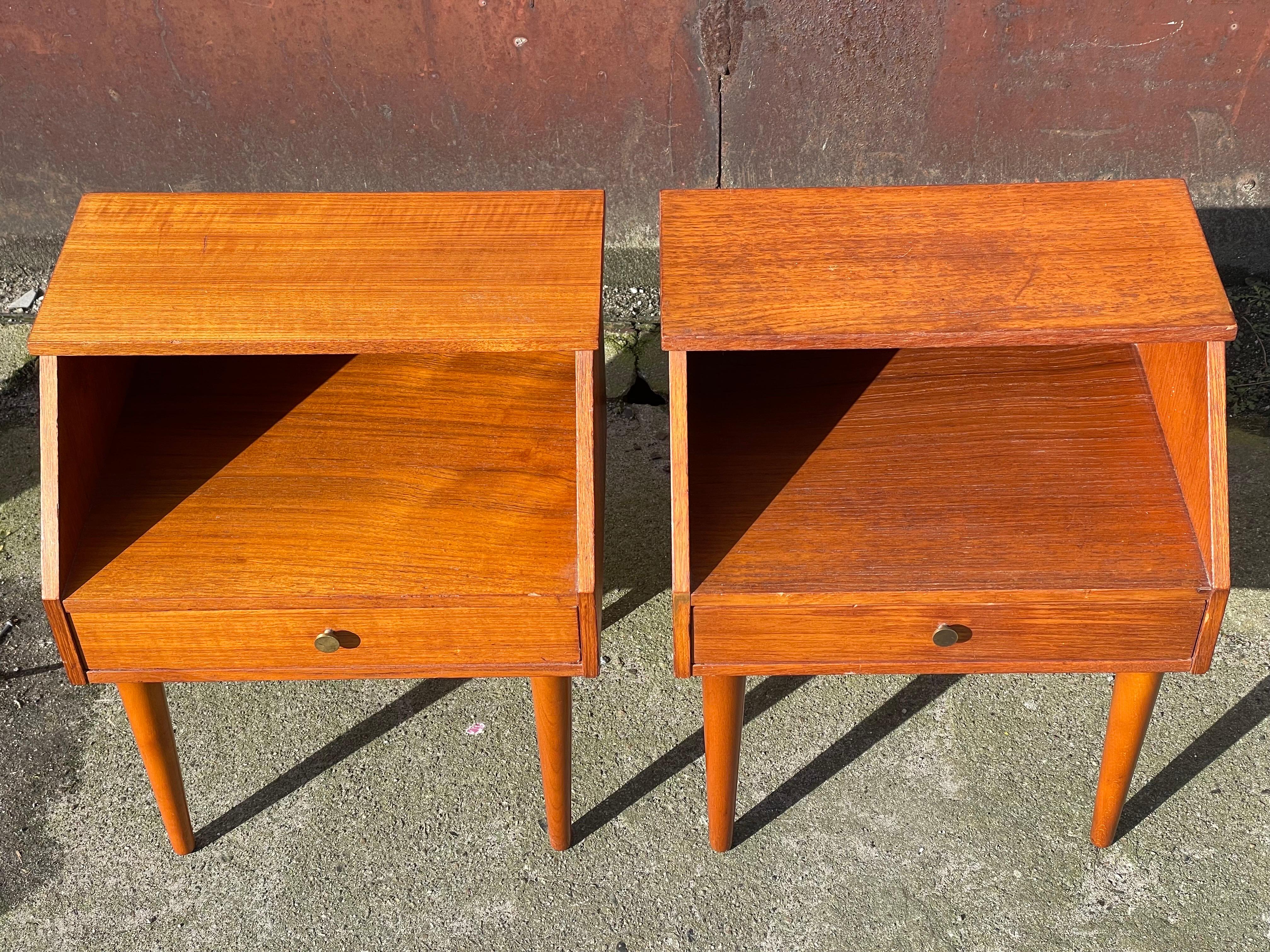 Introducing a stunning set of Danish Mid-Century Modern nightstands from the 1960s. These nightstands are the epitome of sleek, functional design and will be the perfect addition to any modern bedroom.
These Danish Mid-Century Modern nightstands