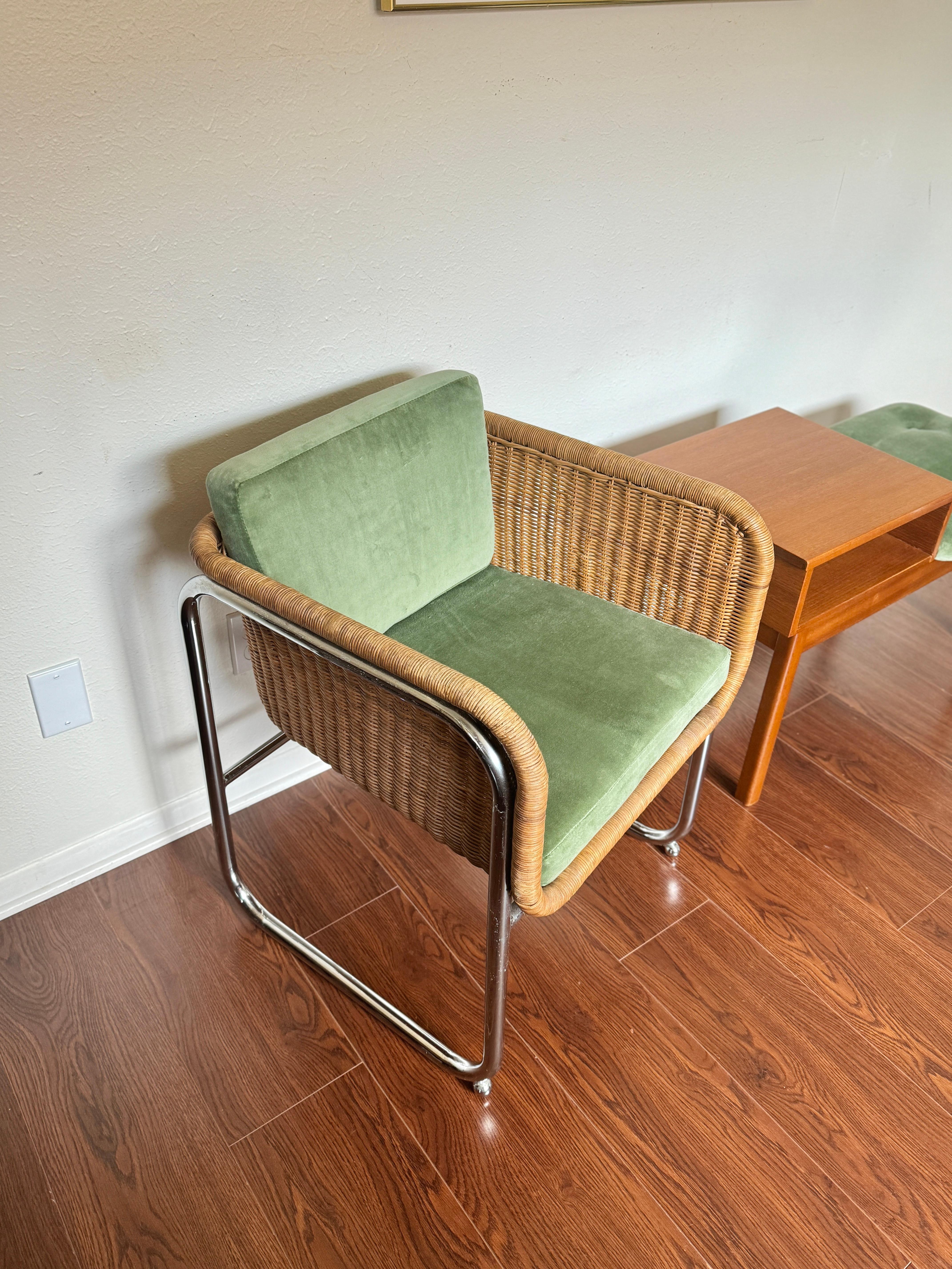 A beautiful vintage model D43 wicker and chrome cantilever chair designed by Preban Fabricius & Jorgen Kastholm for Harvey Probber in Denmark, circa 1960s. Features a cube shaped frame with a woven wicker seat, back and sides resting on a chrome