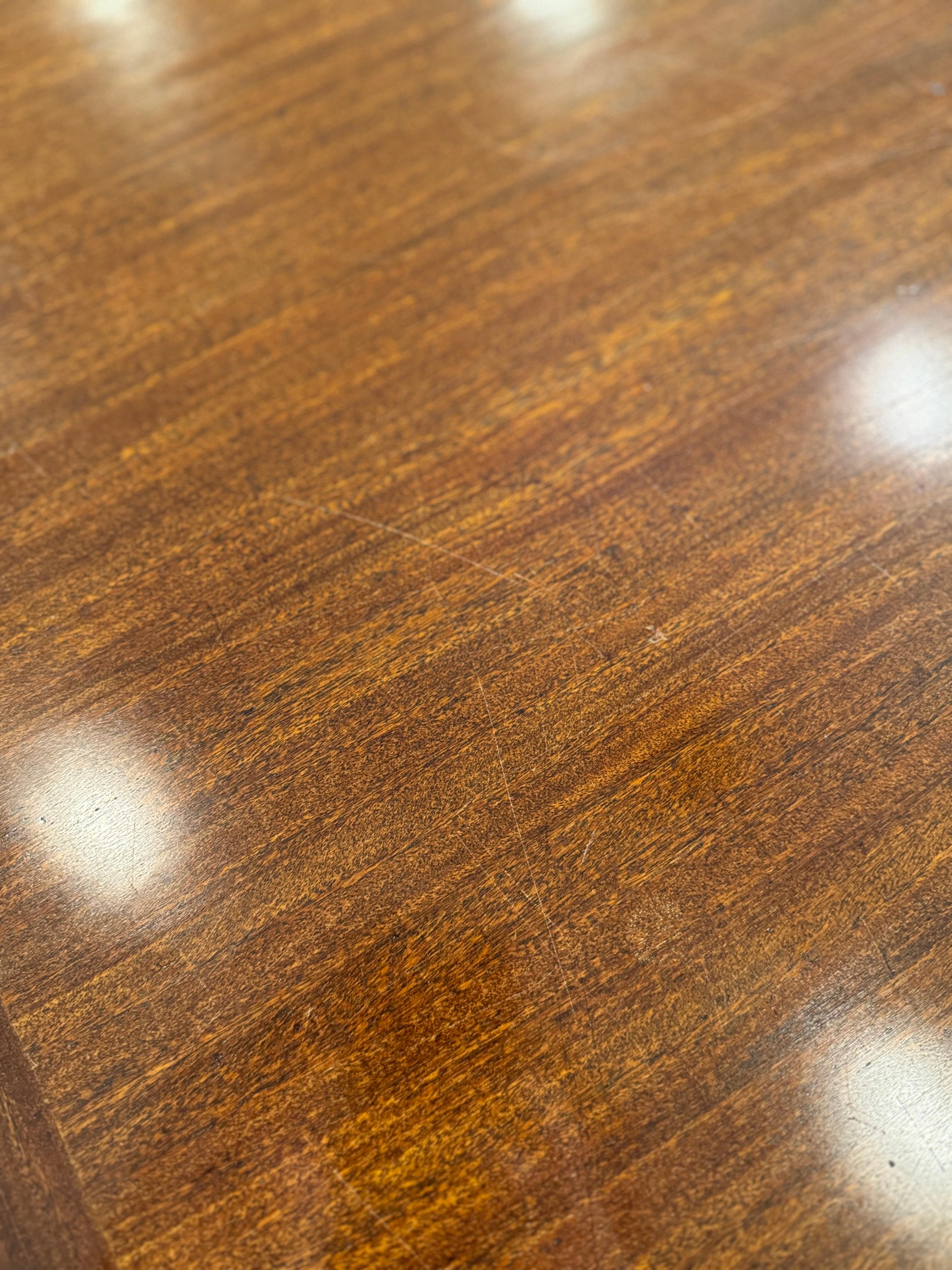A beautifully designed extending draw leaf dining table designed by John Herbert 8