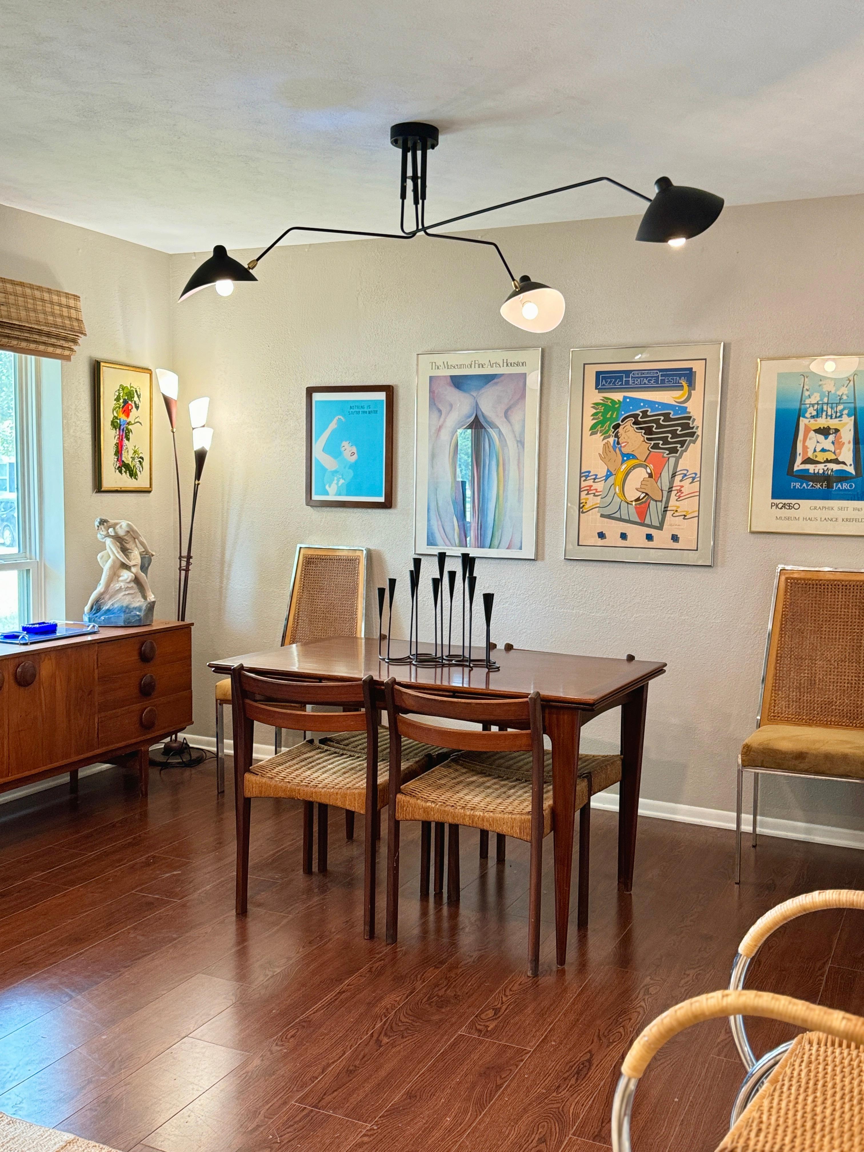 A beautifully designed extending draw leaf dining table designed by John Herbert 11