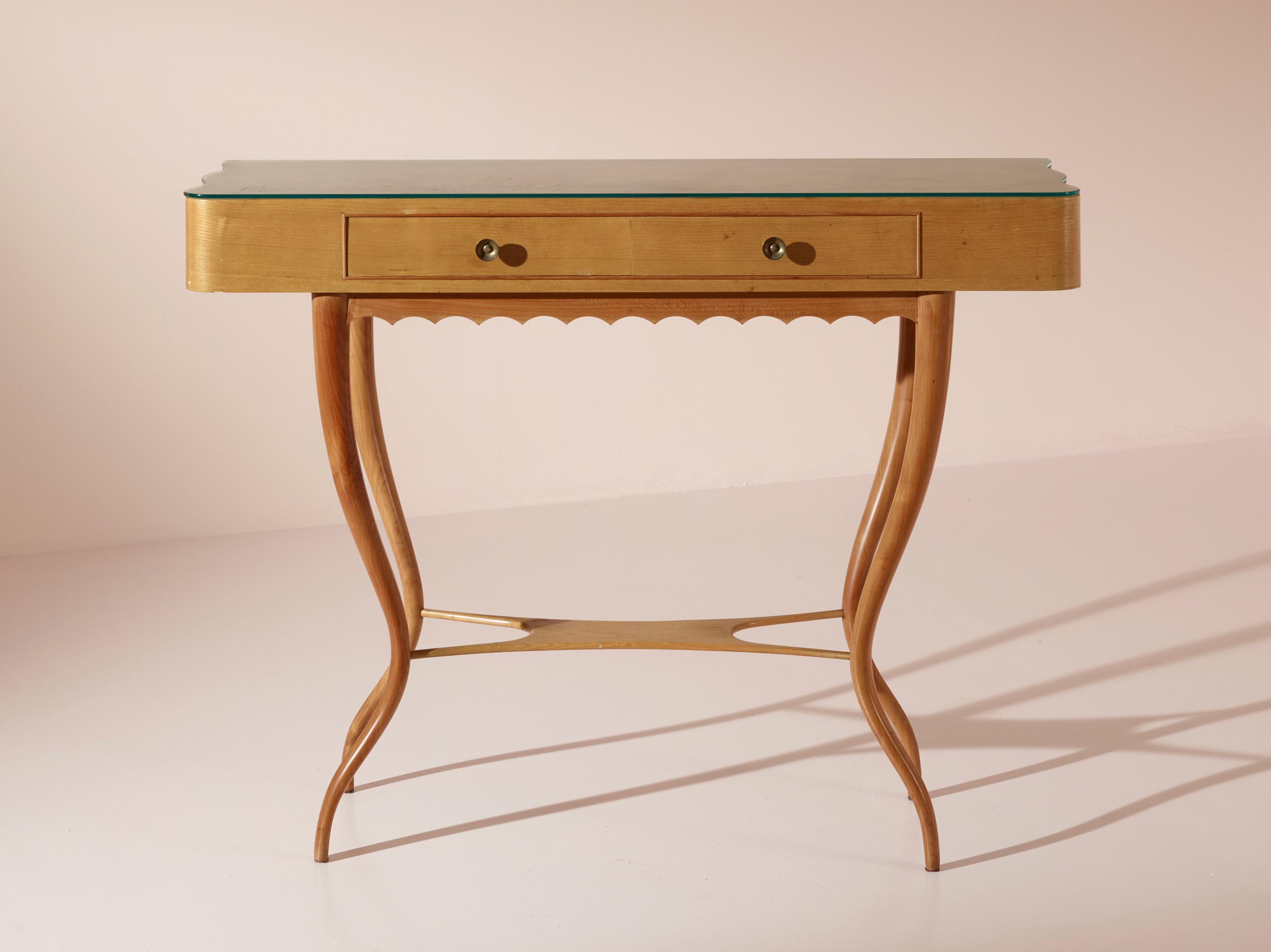 An exquisite console table originating from Chiavari, Italy in the 1950s is a fine example of mid-century craftsmanship. Constructed using durable beechwood, this elegant piece measures 121x40x94cm (WxDxH), exhibiting a clean and lightweight