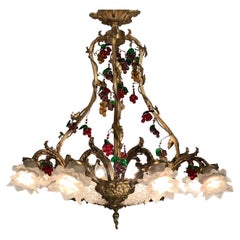Antique A Belle Epoque Eight Arm Chandelier Modelled with Dionysis/Bacchus Masks 