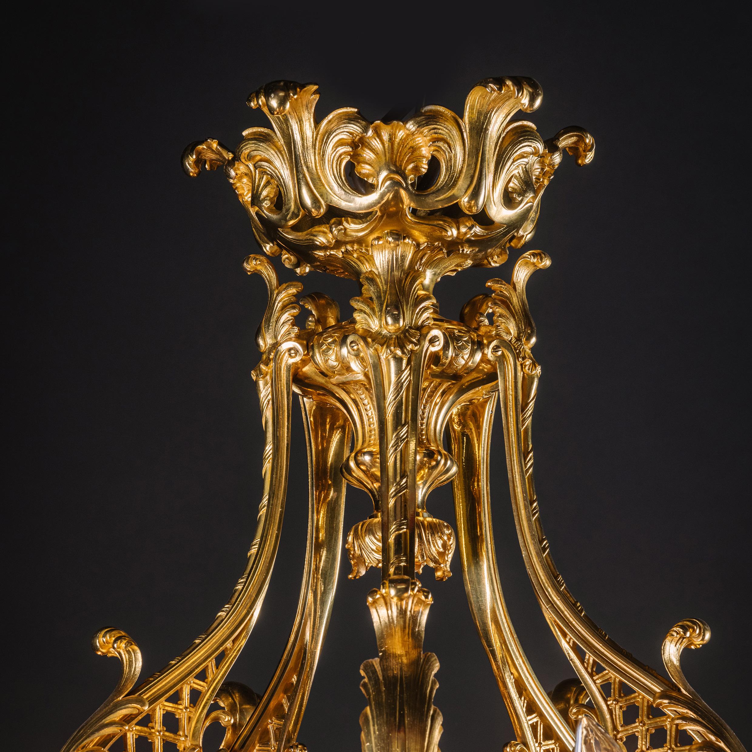 XIXe siècle Lustre Belle Époque à vingt-un feux en bronze doré et patiné en vente