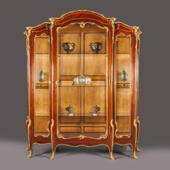 A Belle Epoque Gilt-Bronze Mounted Mahogany Vitrine Cabinet by François Linke