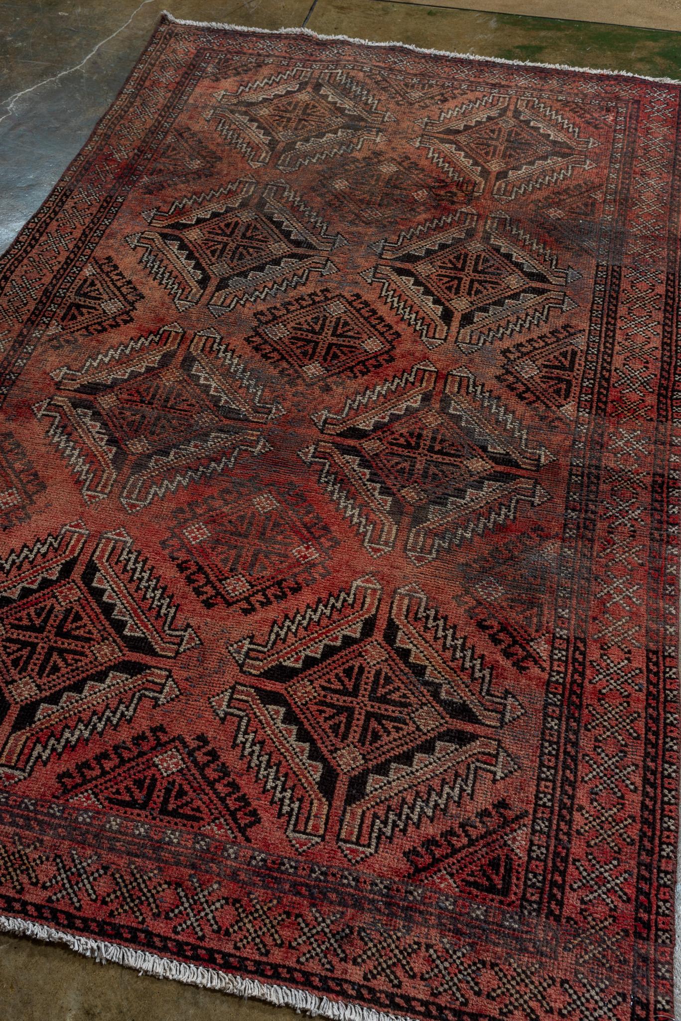A Belouch Rug circa 1940. Handknotted with 100% wool yarn.