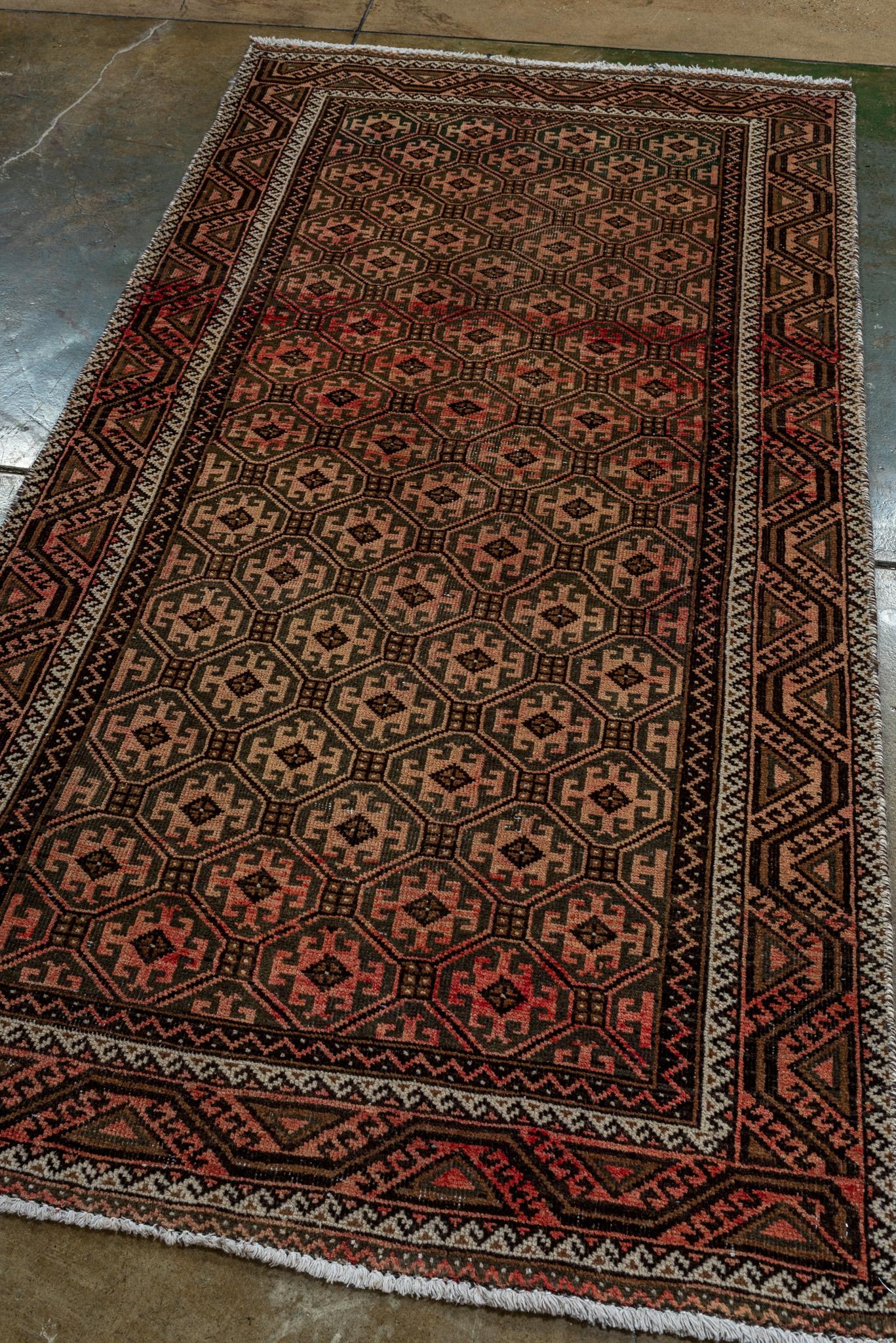 A Belouch Rug circa 1950. Hand Knotted and made of 100% wool yarn.