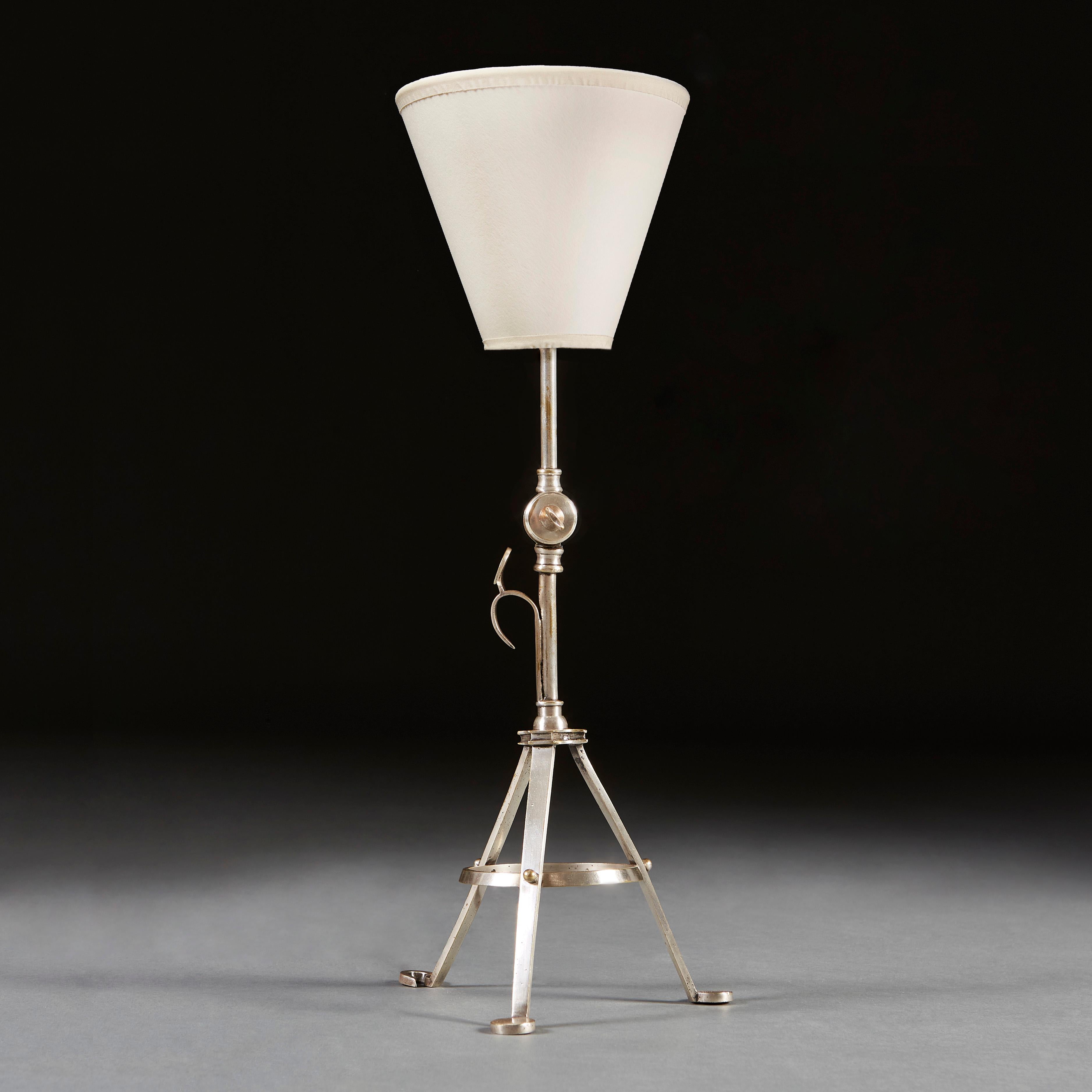 An unusual 19th century tripod lamp by Benson.