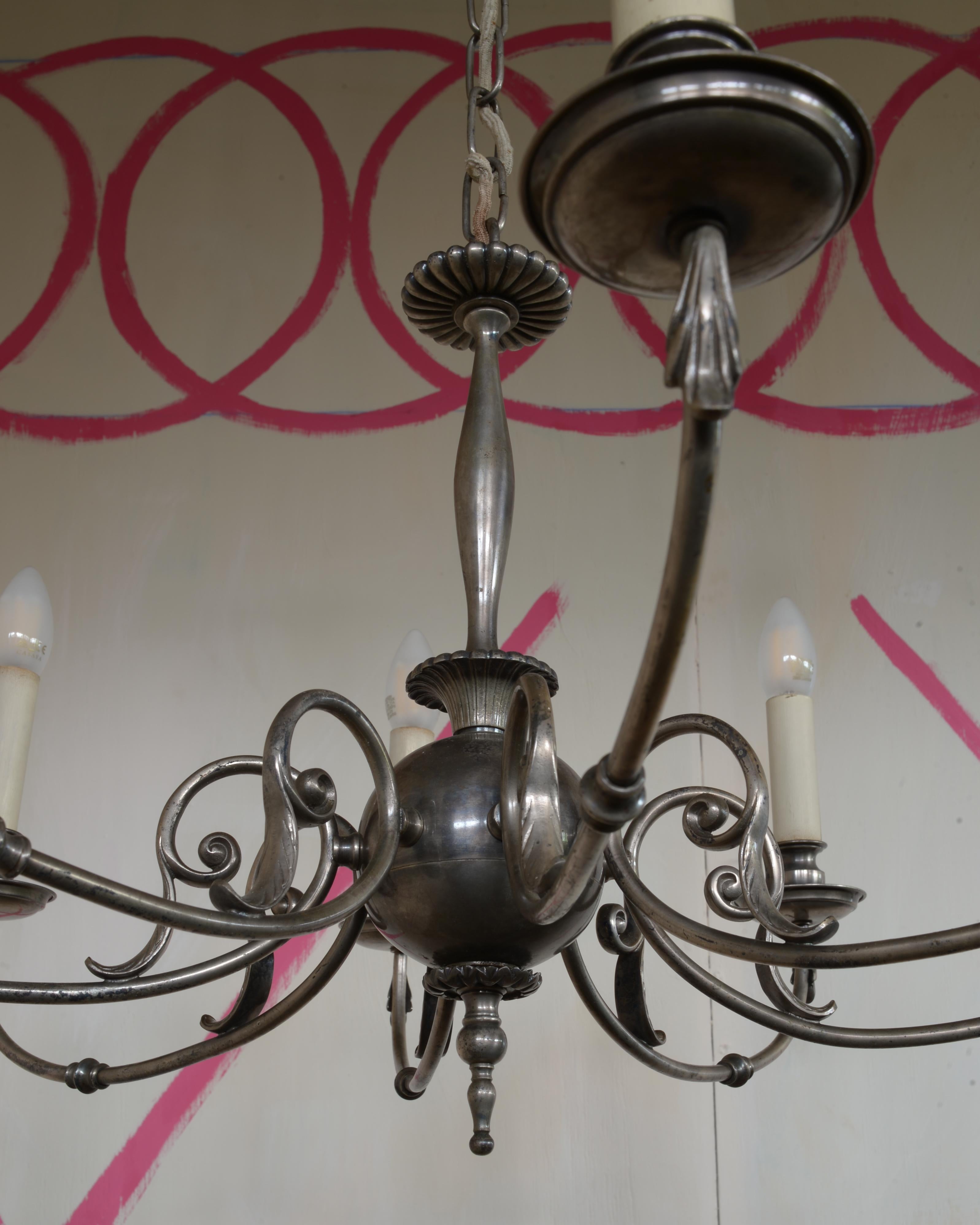 A Berlin Deko Eight Light Chandelier Made of a Silver Toned Alloy in vendita 1