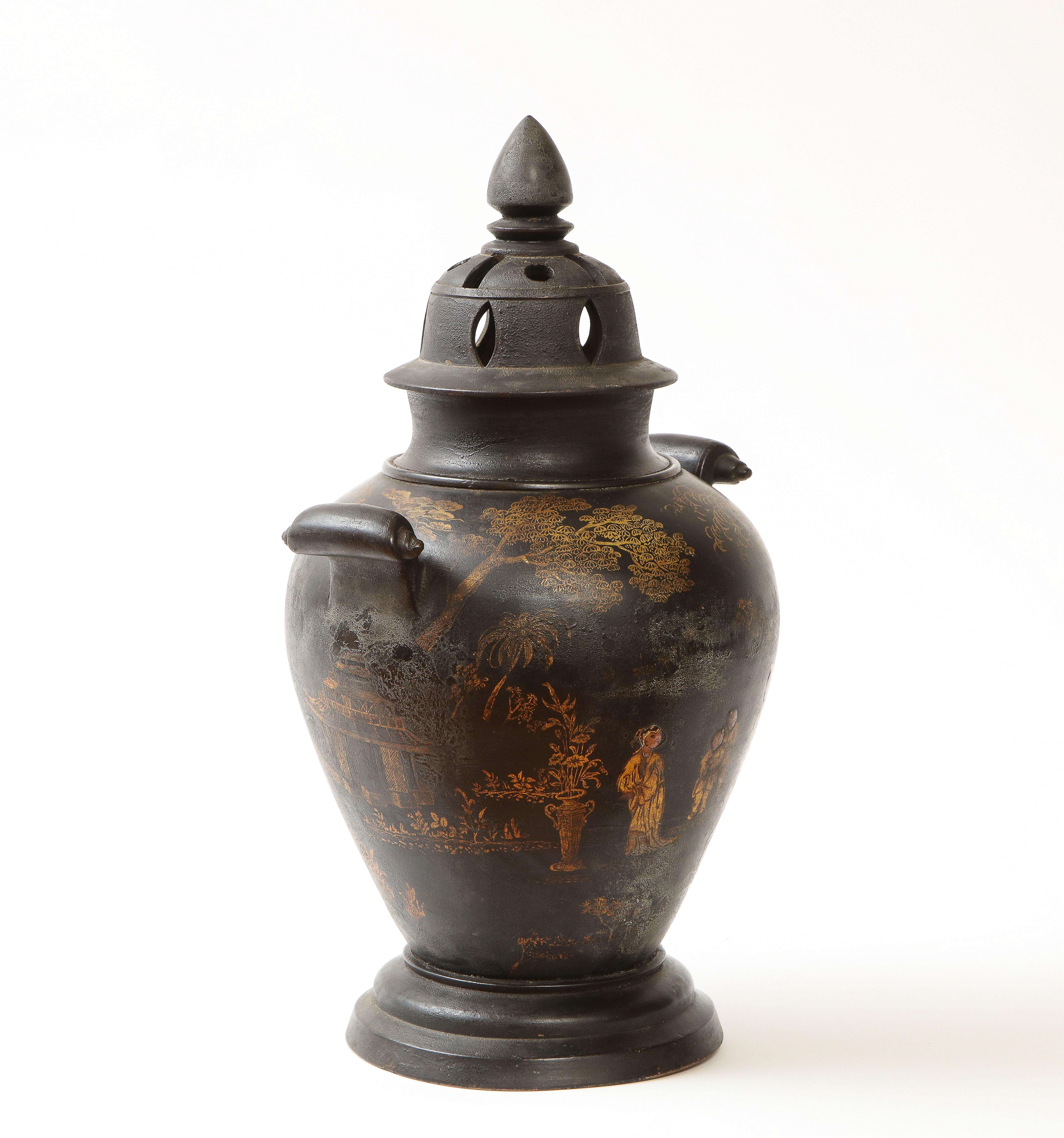 Of ginger jar shape with outscrolled handles, surmounted by a pierced lid with knob-form finial; decorated with Court figures in a pagoda riverscape.