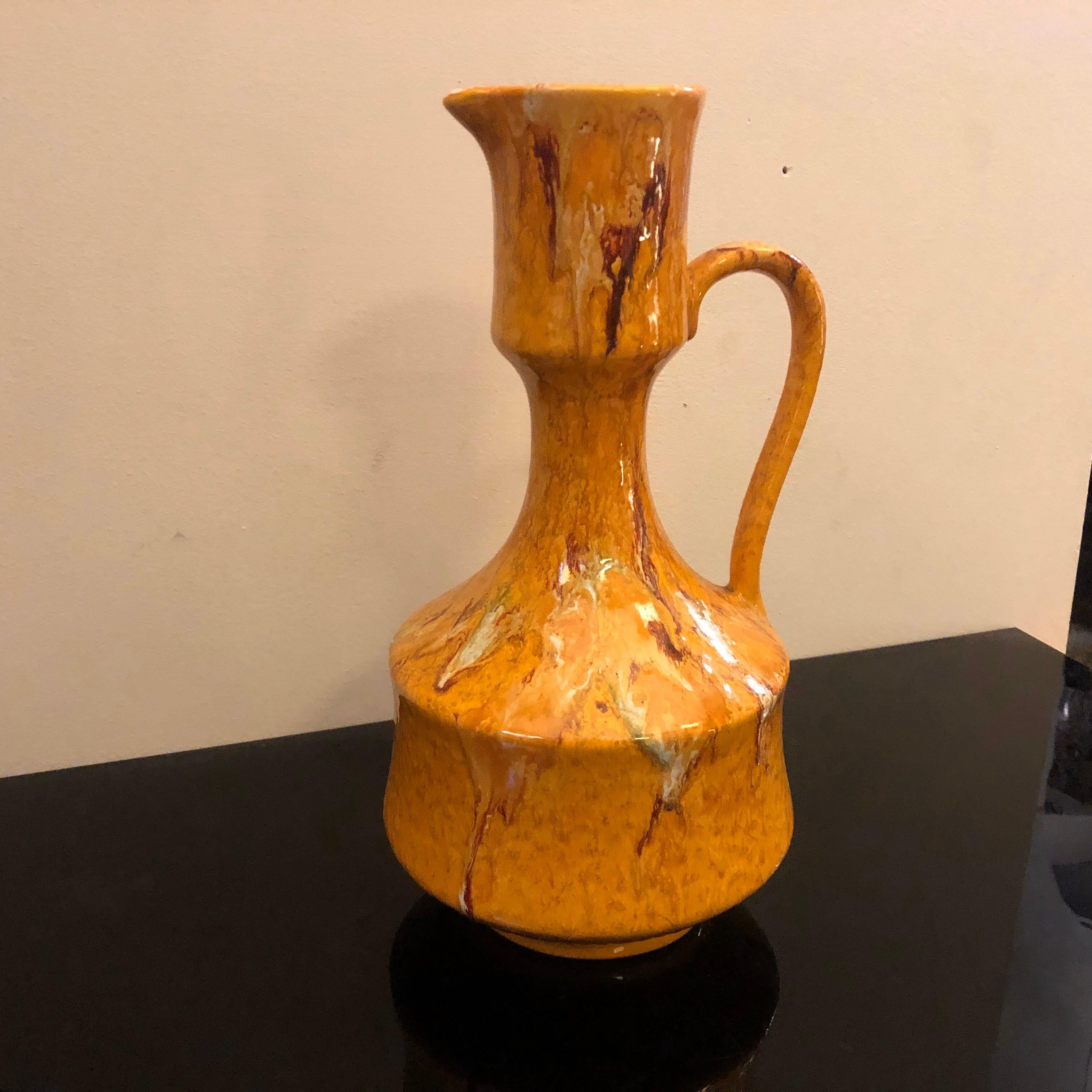 A particular yellow ceramic jug made in Italy in the 1970s by Bertoncello, it's in perfect conditions.