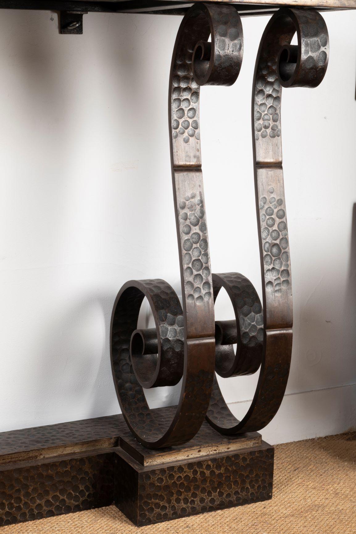 A big art Deco period 1930 wrought iron console with marble top.

Wrought iron console with grey marble top, Art Deco period, 1930.
H: 91cm, W: 142cm, D: 40cm