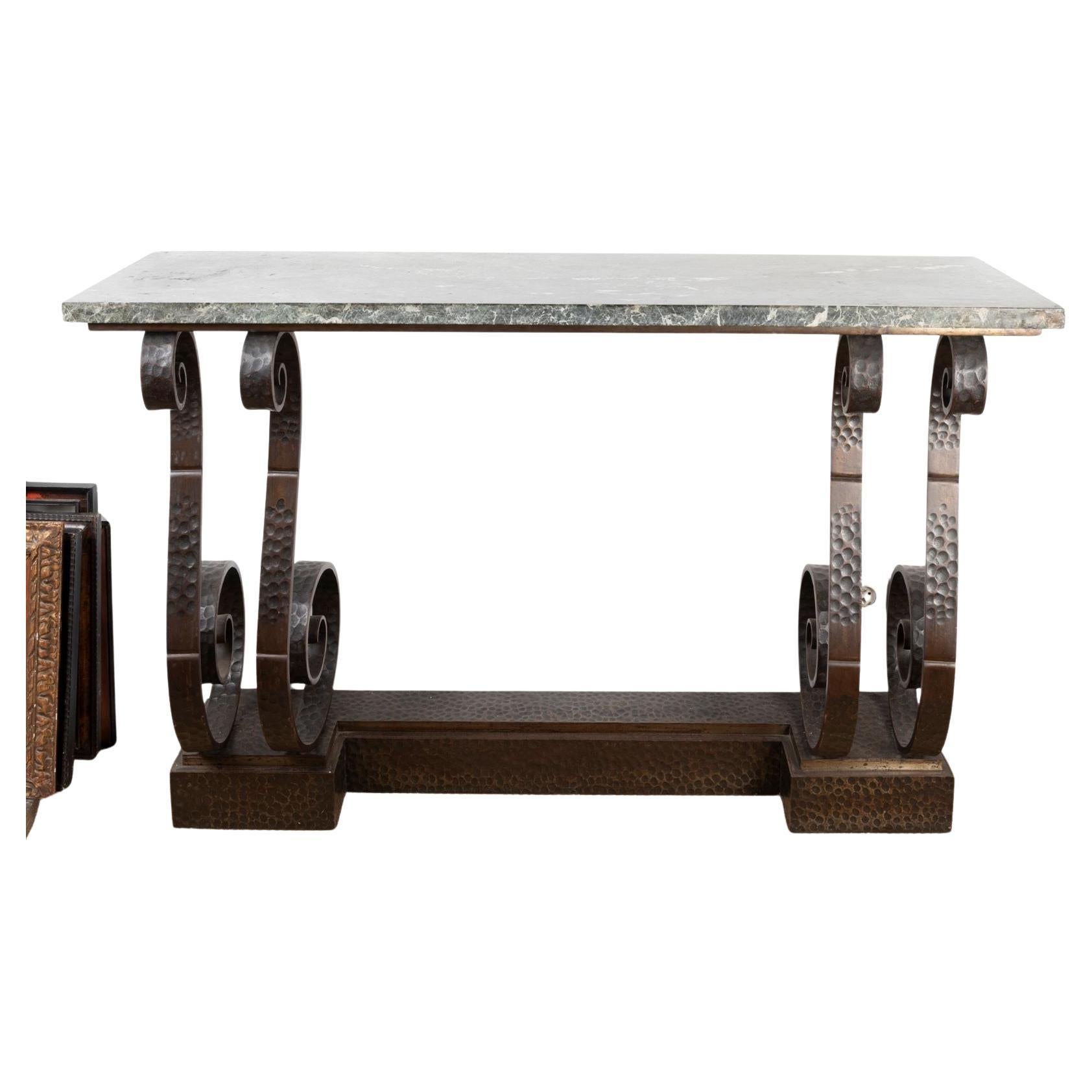 An big Art Deco console table, 1930, in wrought iron with marble top.