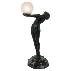 A big bronze lamp “Clarté” signed: Le Verrier (1891-1973) France, circa 1940.