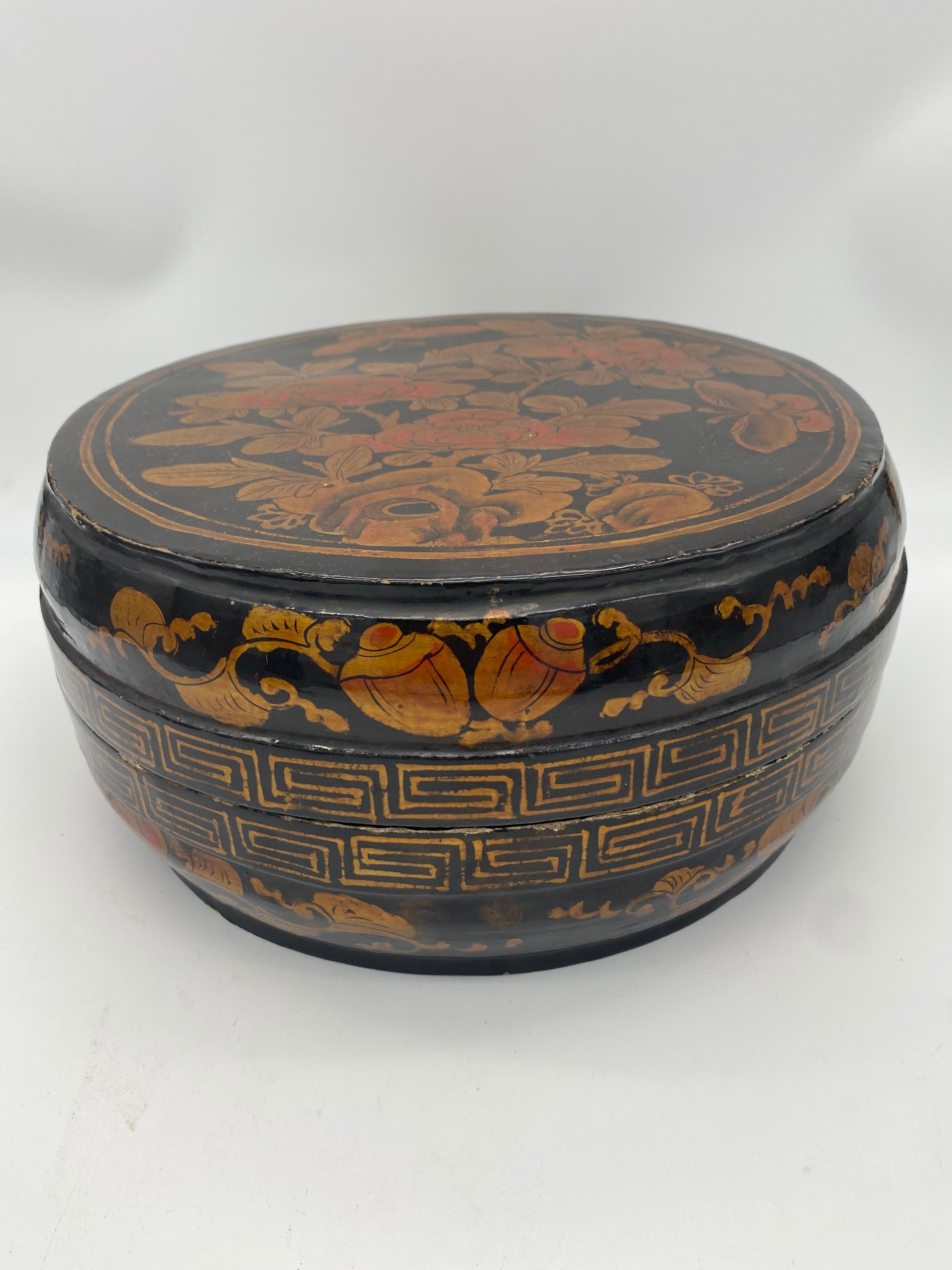 A big golden black lacquer Chinese box, hand paint beautiful flowers.