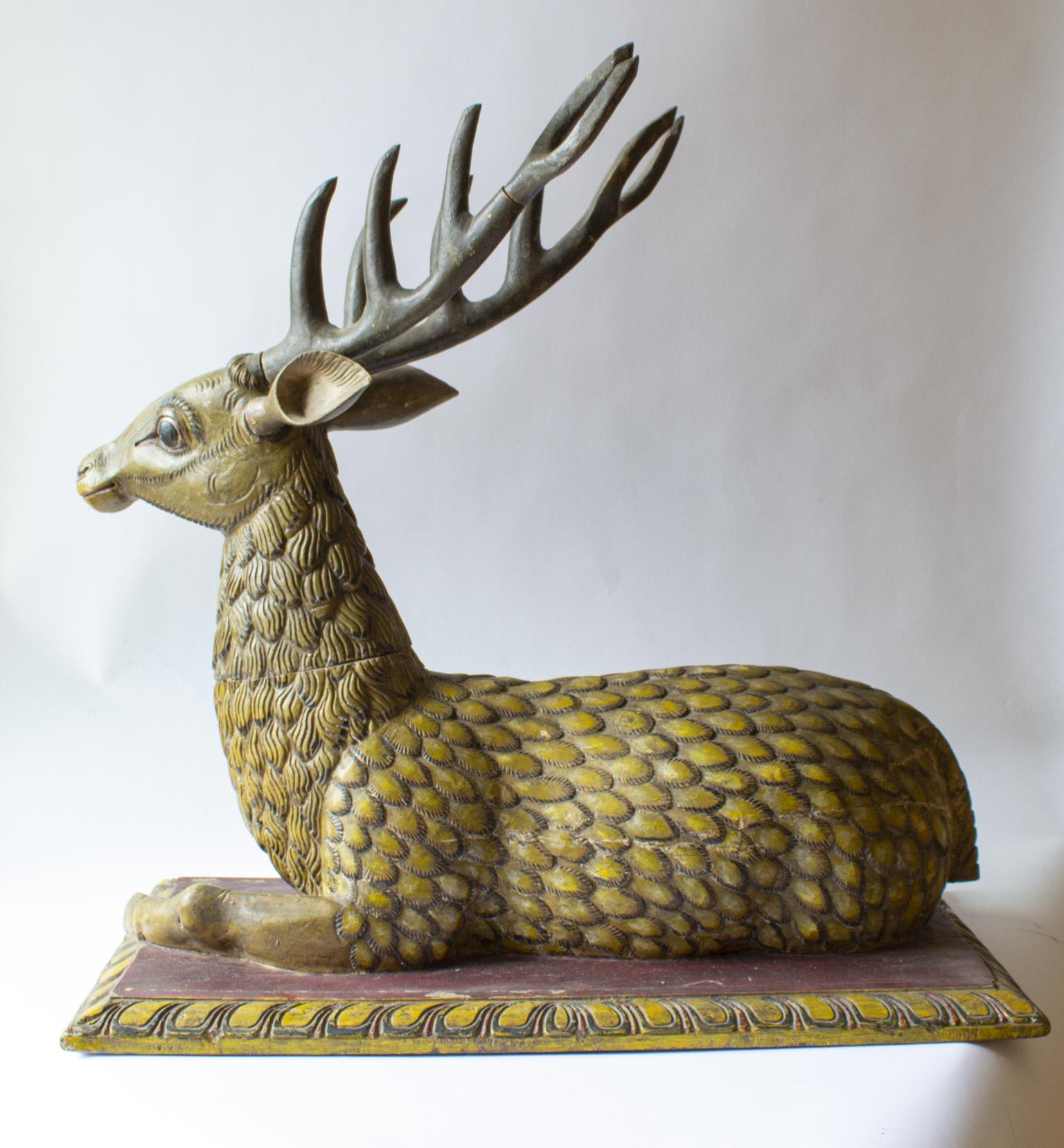 A big hand carved painted stag sculpture in wood, early 1800th century. Preowned by a collector. This sculpture are one of a kind.

The stag deer are a symbol of spiritual authority, a deer stag is here depicted in all its magnificent elegance.