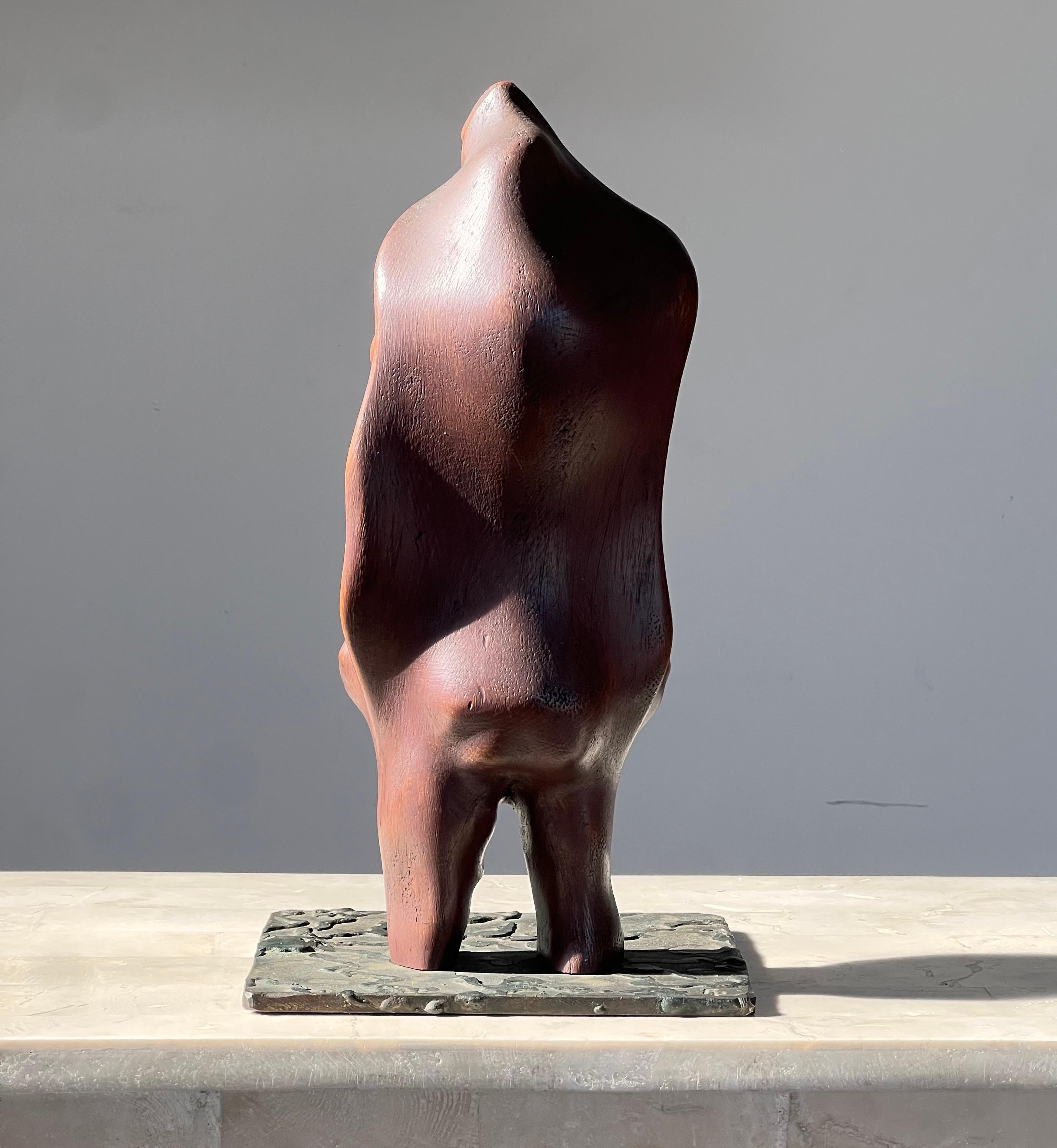 Hand-Carved A biomorphic wood and iron sculpture of a woman, signed, mid 20th century For Sale
