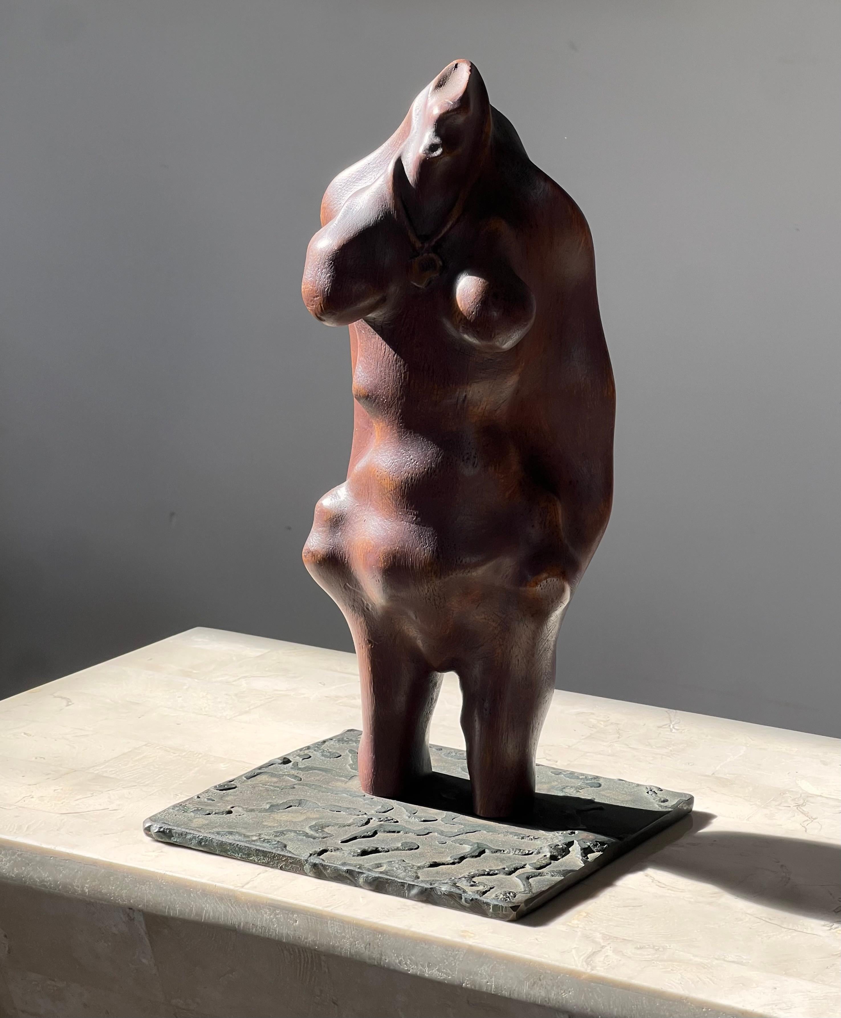 A biomorphic wood and iron sculpture of a woman, signed, mid 20th century For Sale 1