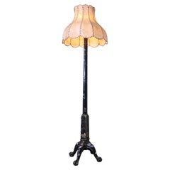 A Black Chinoiserie Lacquer Decorated Standard Lamp