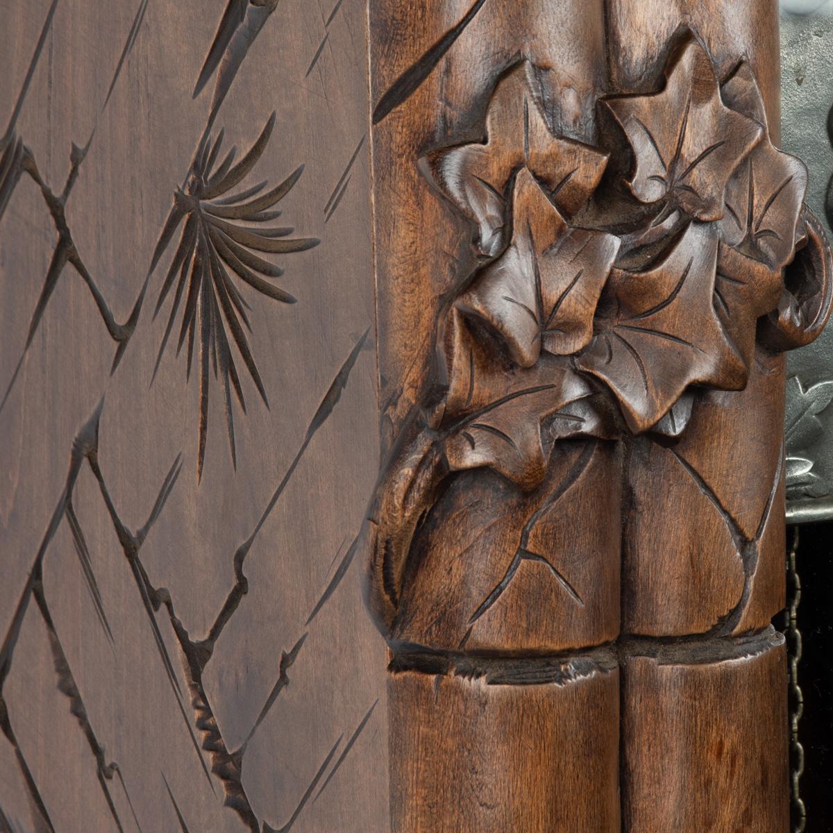A ‘Black Forest’ linden wood long case clock by Spring of Interlaken For Sale 4