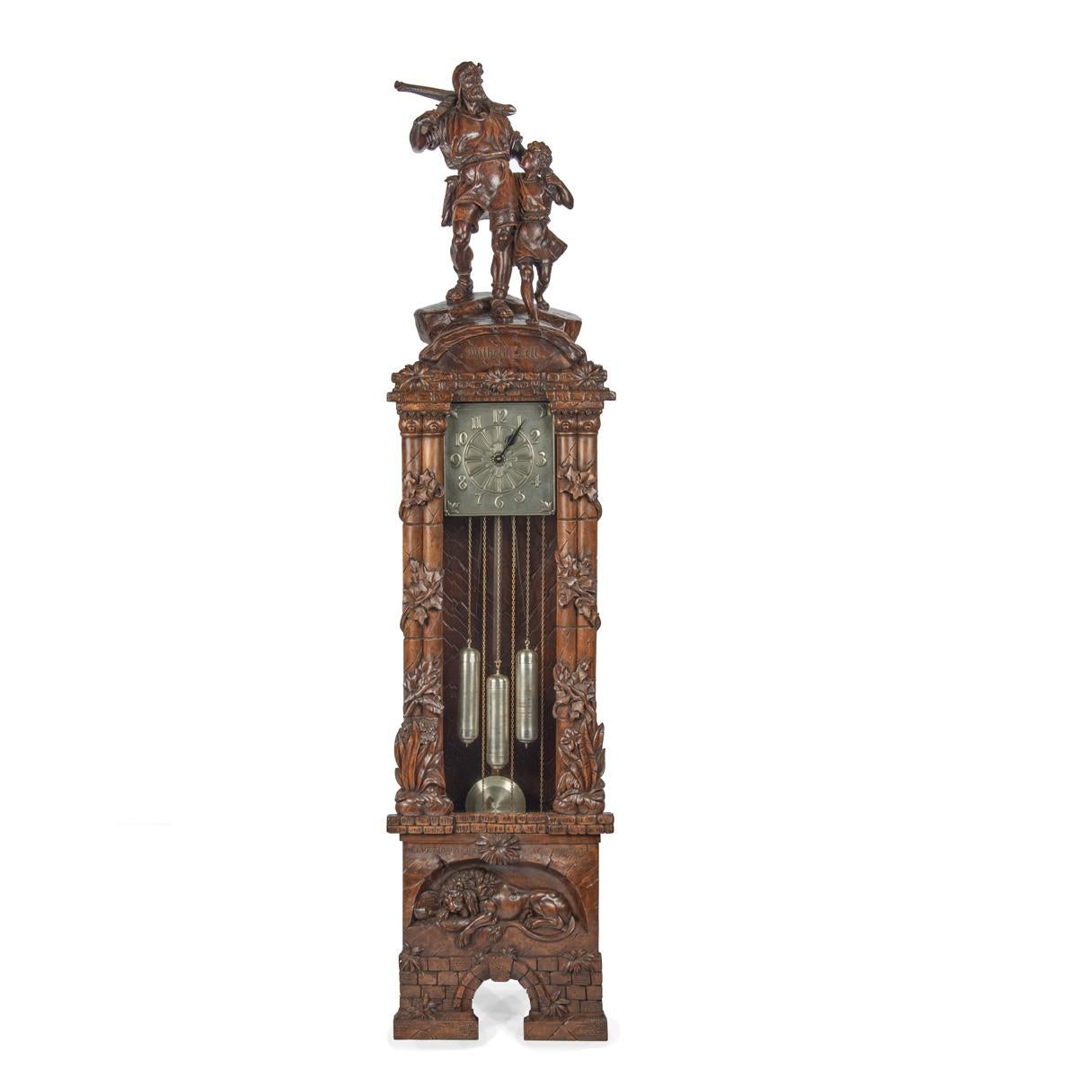 A ‘Black Forest’ linden wood long case clock by Spring of Interlaken For Sale 1