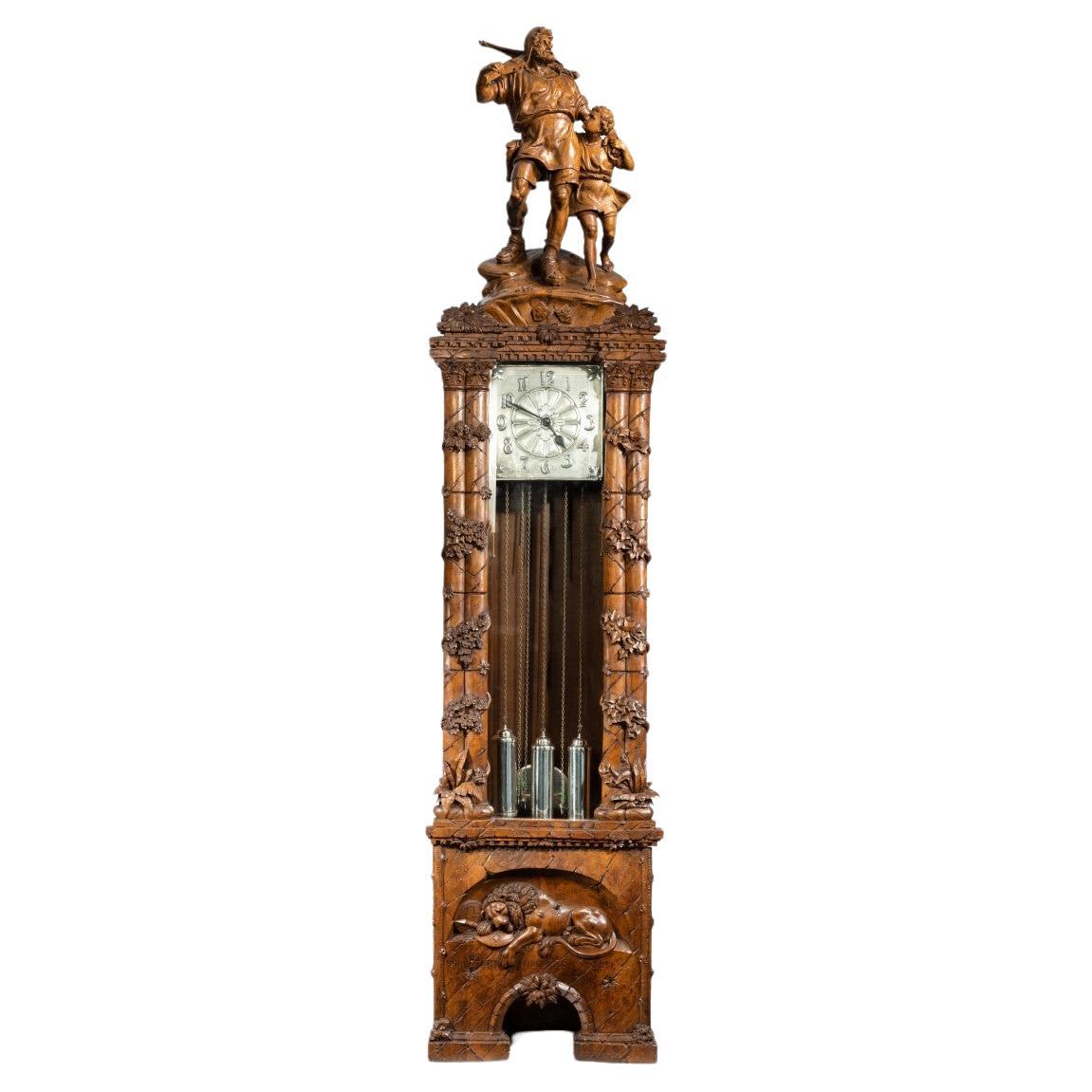 A ‘Black Forest’ linden wood long case clock by Spring of Interlaken For Sale