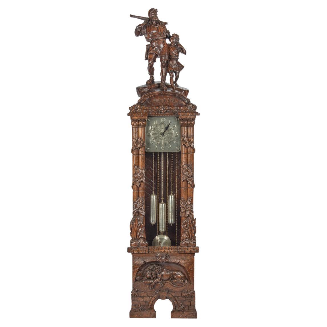 A ‘Black Forest’ linden wood long case clock by Spring of Interlaken