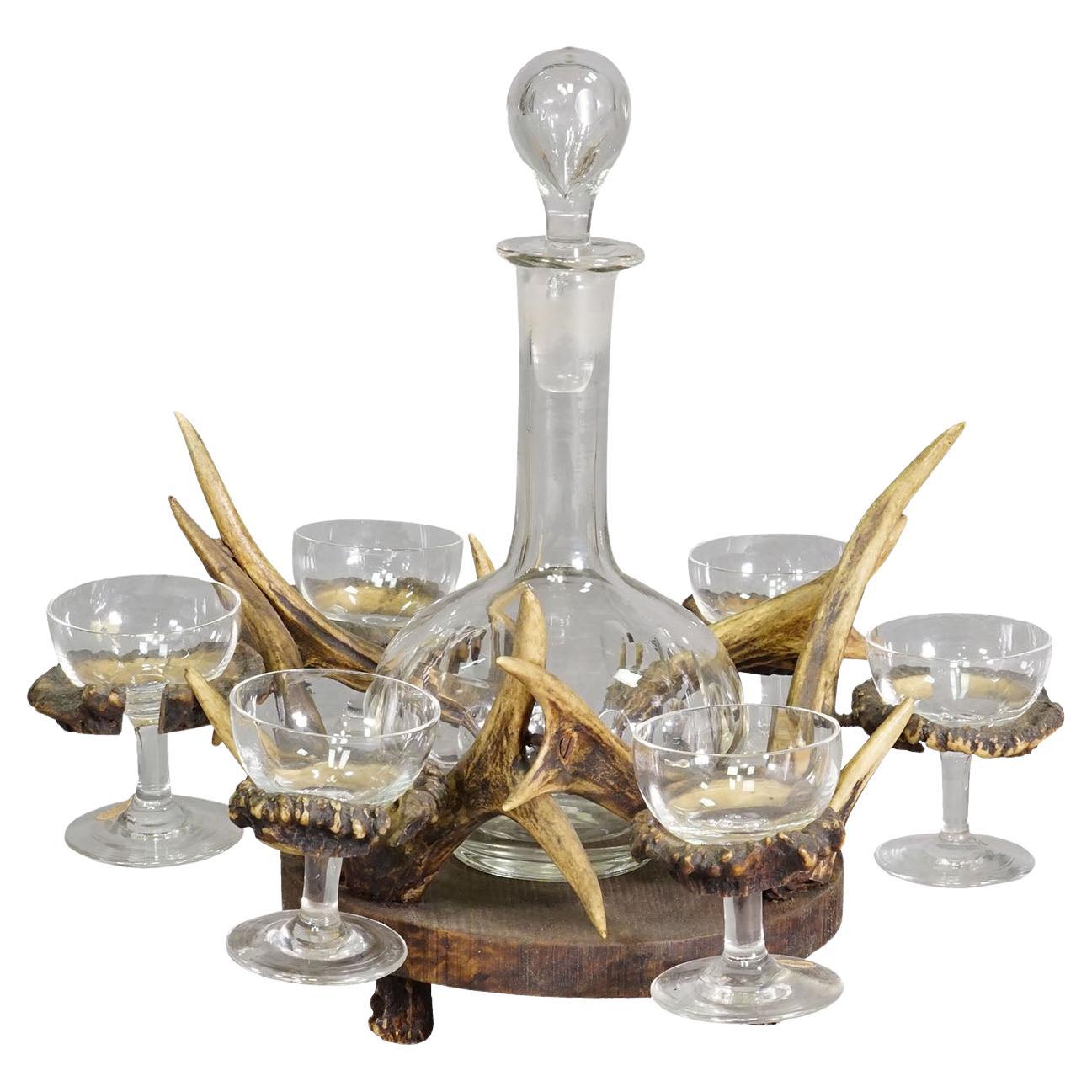 A Black Forest Rustic Liqueur Set with Decanter and Six Glasses For Sale