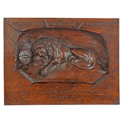 Una placa de nogal "Black Forest" del "León de Lucerna"