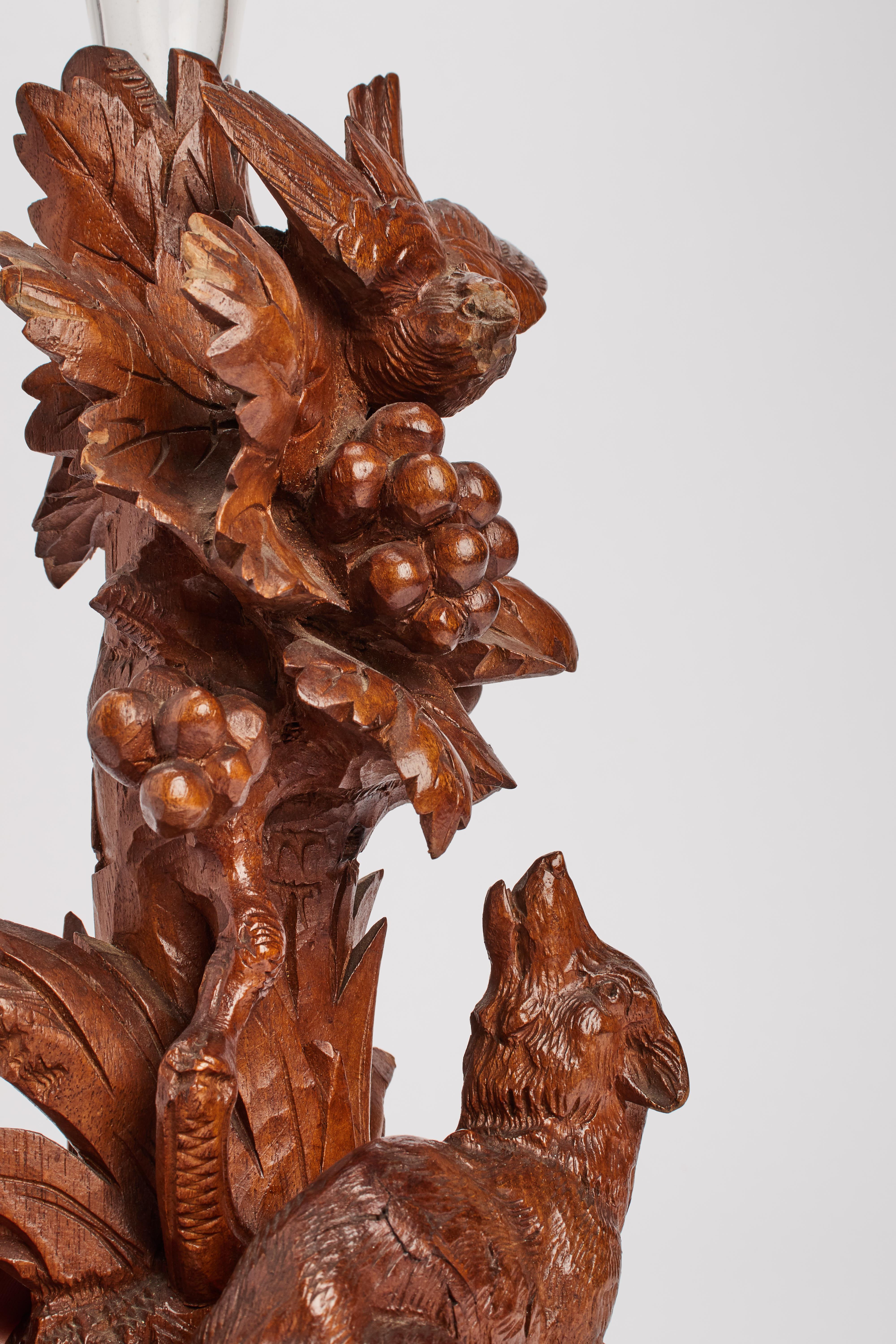 Glass A black forrest wooden sculpture with fox and bird, with a vase, Germany 1880 For Sale