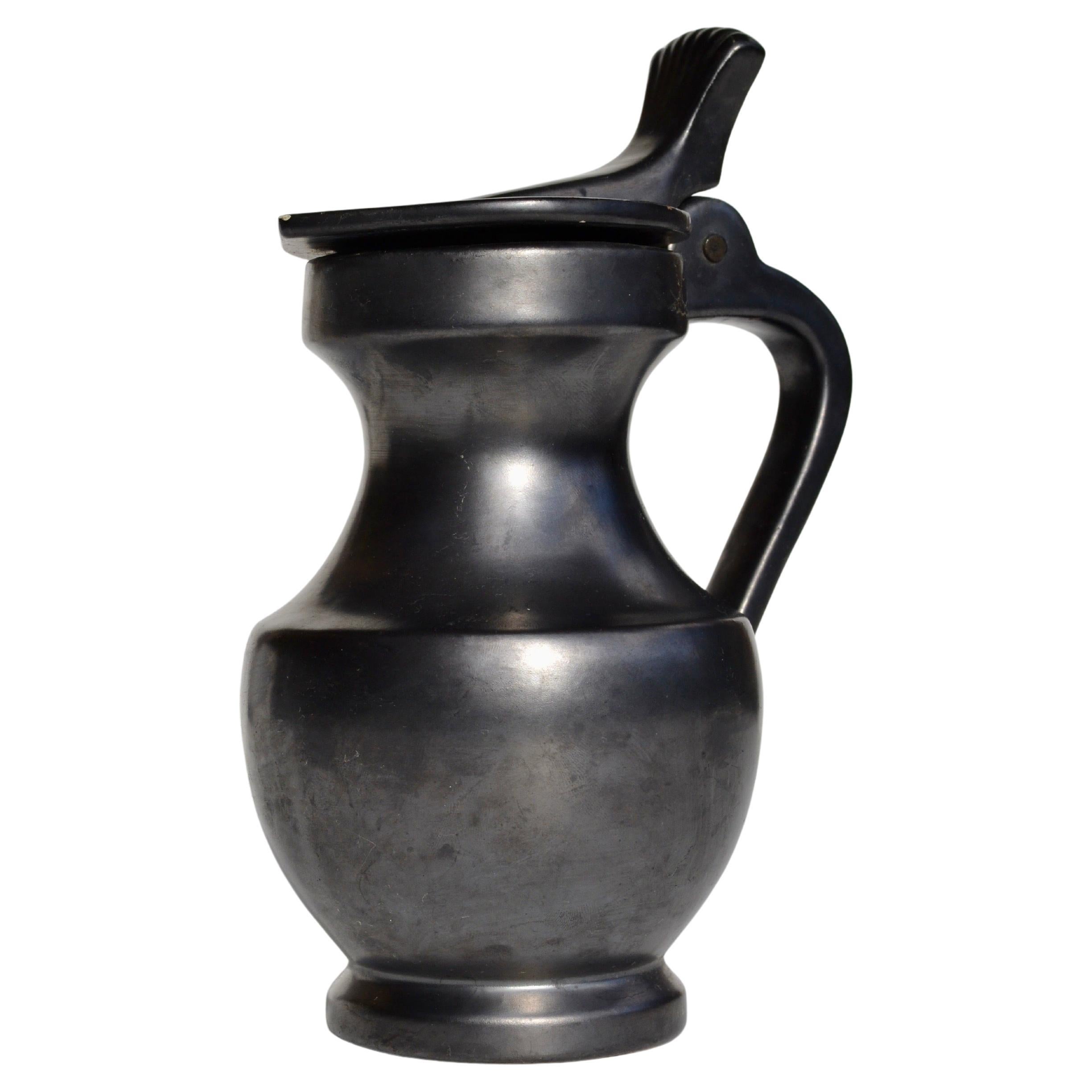 A Black Glazed Ceramic Pitcher, French Mid-Century Modern, circa 1950
