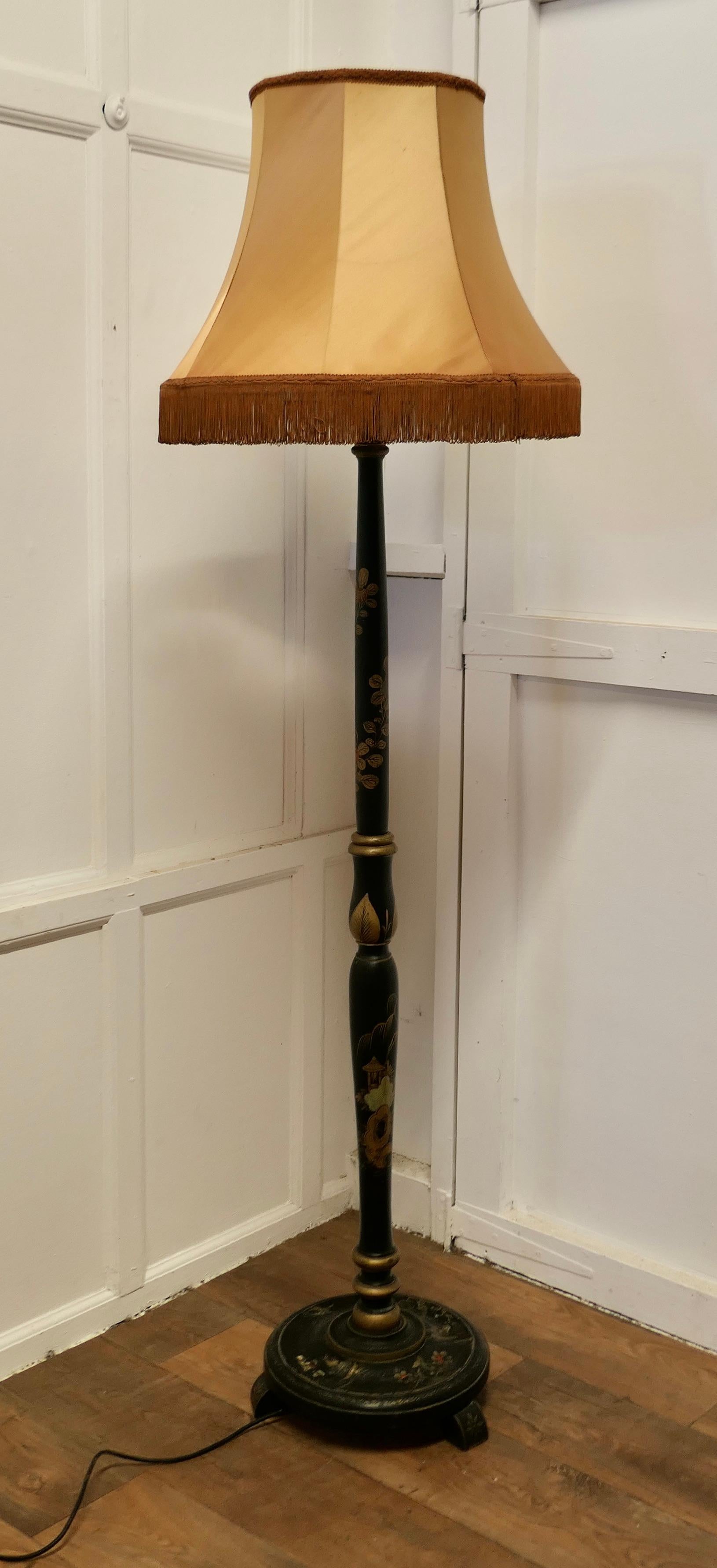 A Black Lacquer and Gold Decorated Standard Lamp

This is a fine quality Chinoiserie lamp it stands on a turned round wooden base which has gold and coloured floral decoration as has the turned upright which has more scenes of flowers 
The lamp has