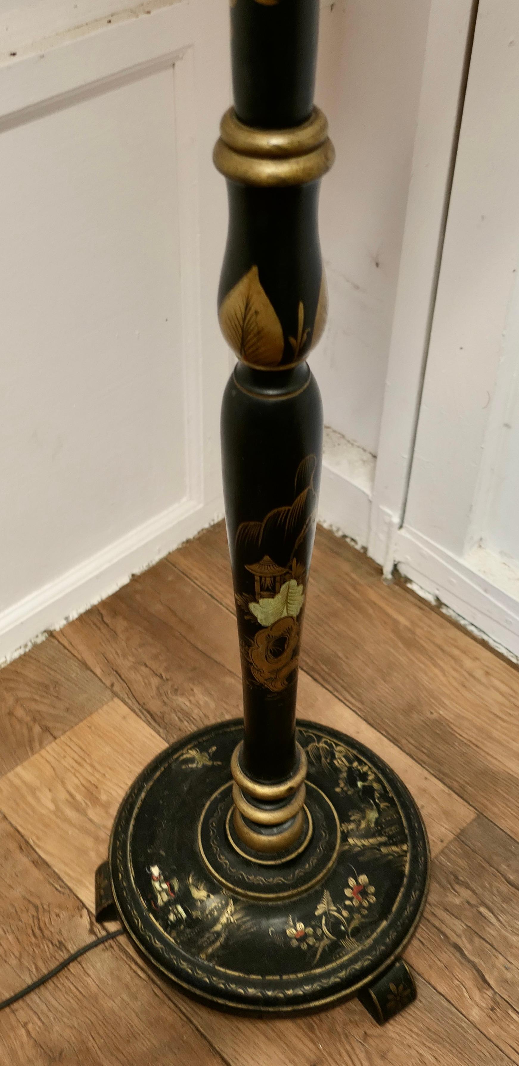 Chinoiserie A Black Lacquer and Gold Decorated Standard Lamp    For Sale