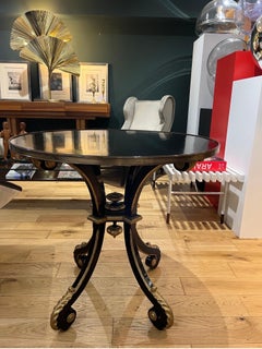 A Laque noire et guéridon or att. Maison Jansen