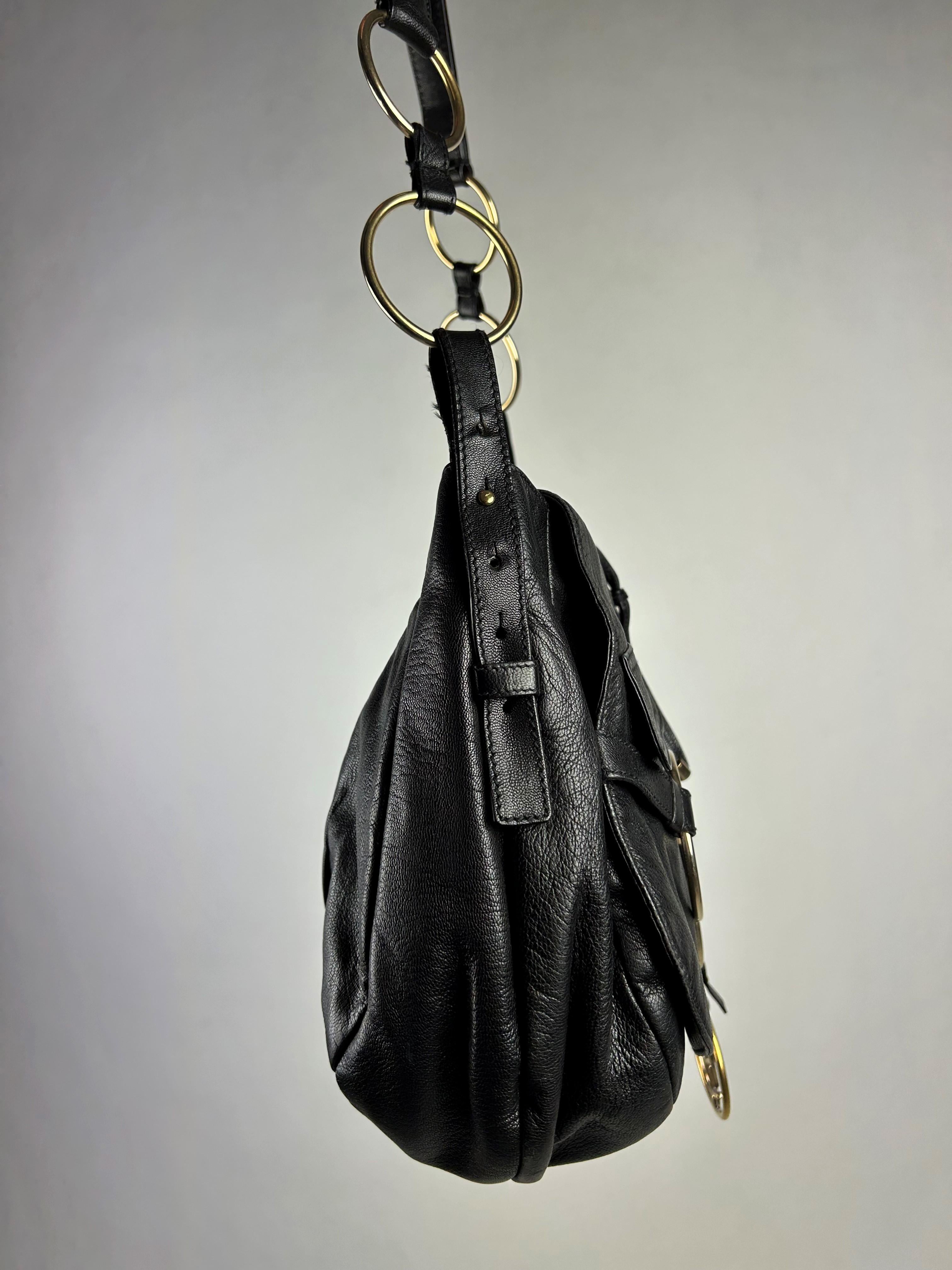 A Black Leather Saharienne bag by Yves Saint Laurent Rive Gauche Circa 1980 9