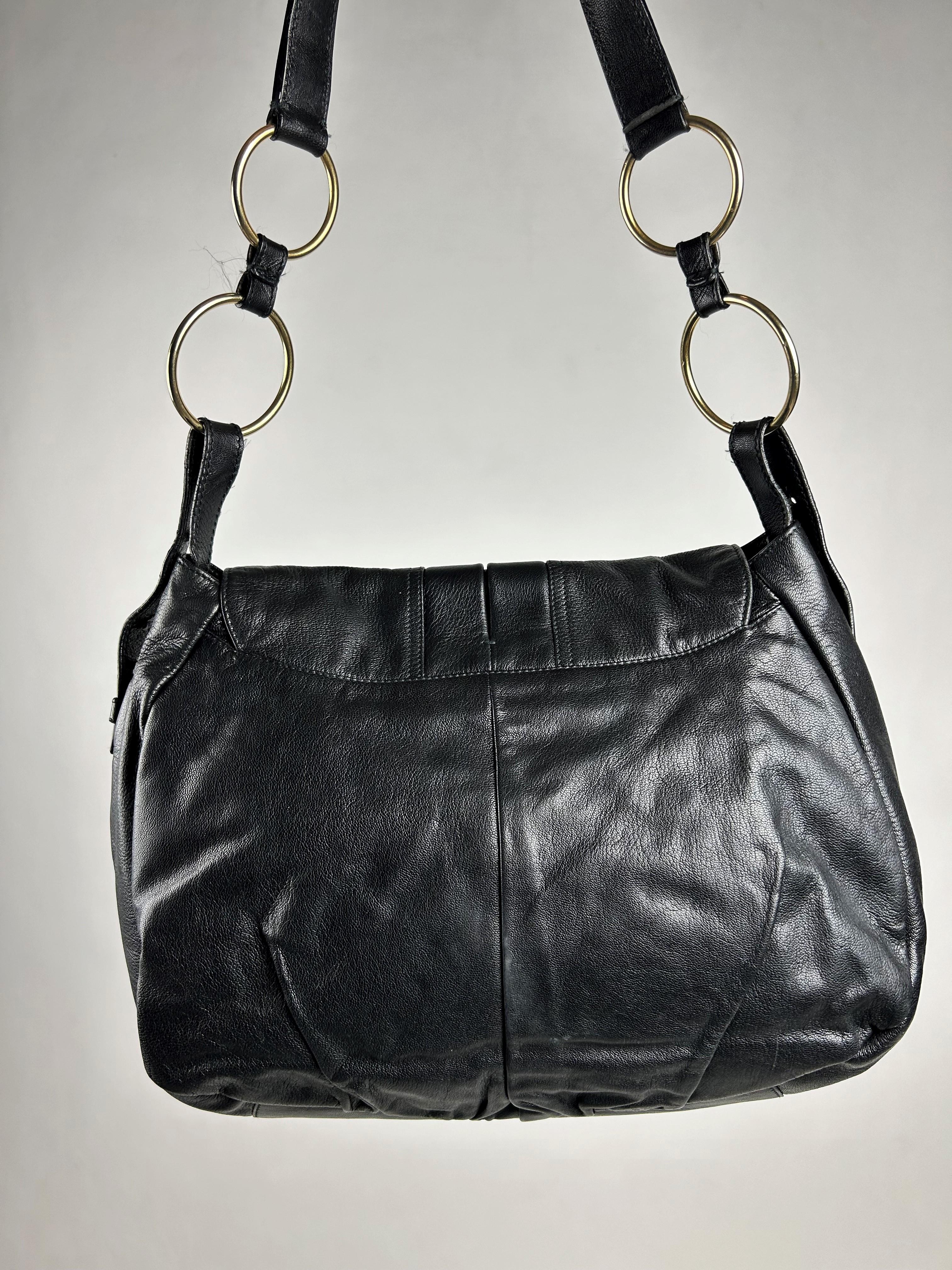 A Black Leather Saharienne bag by Yves Saint Laurent Rive Gauche Circa 1980 10